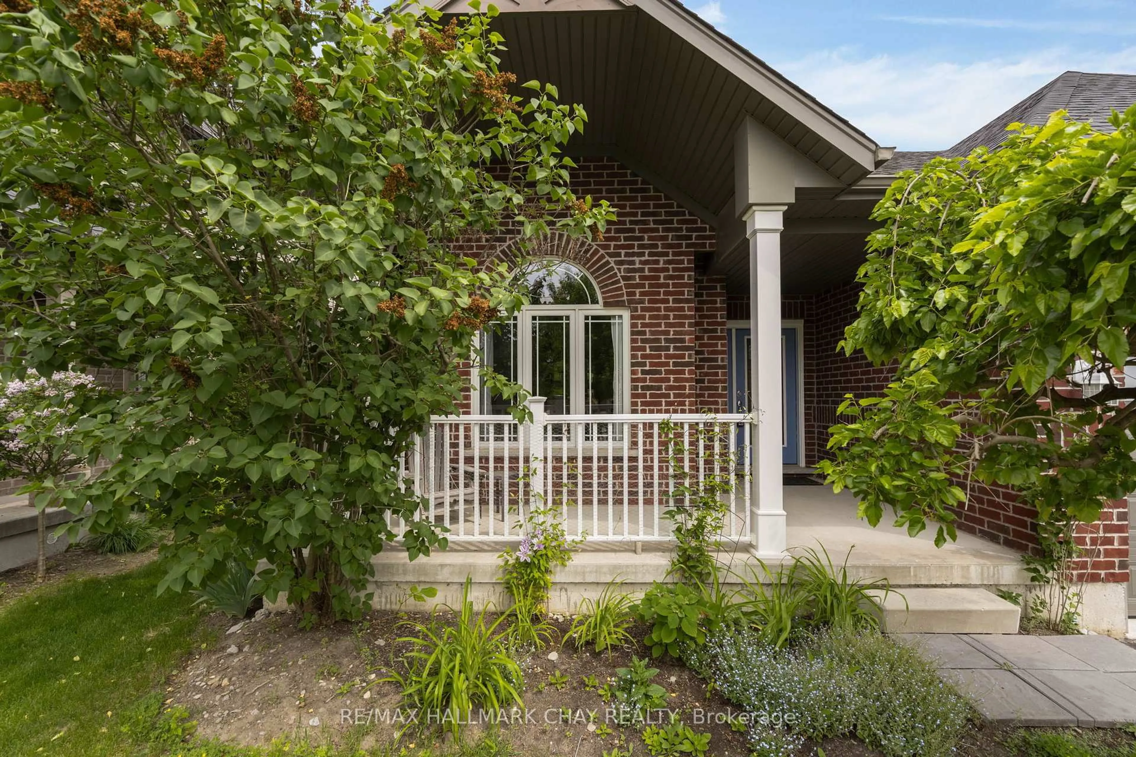 Home with brick exterior material, street for 60 Brownley Lane, Essa Ontario L3W 0P9