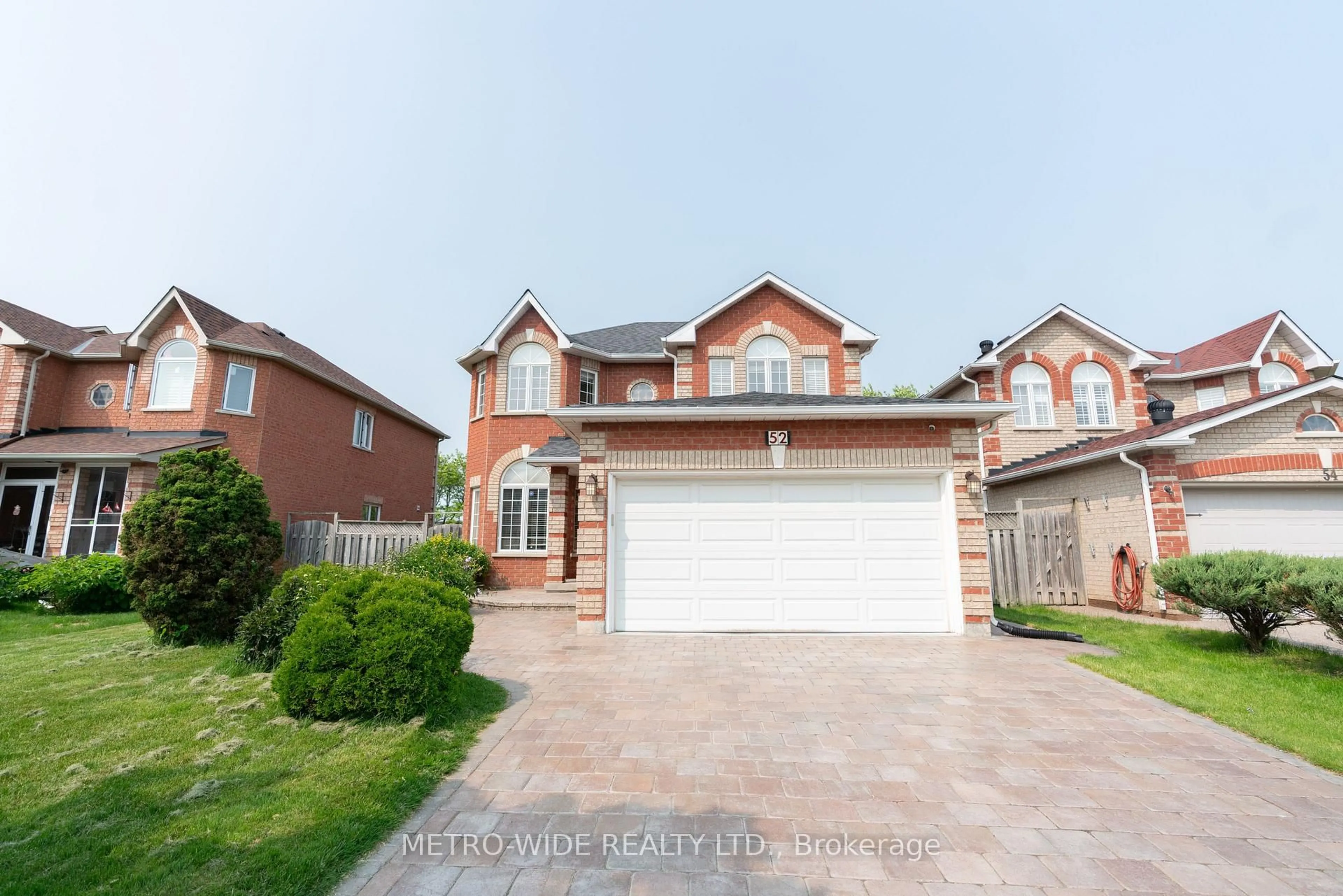 Home with brick exterior material, street for 52 Hepburn St, Markham Ontario L3S 3Z9