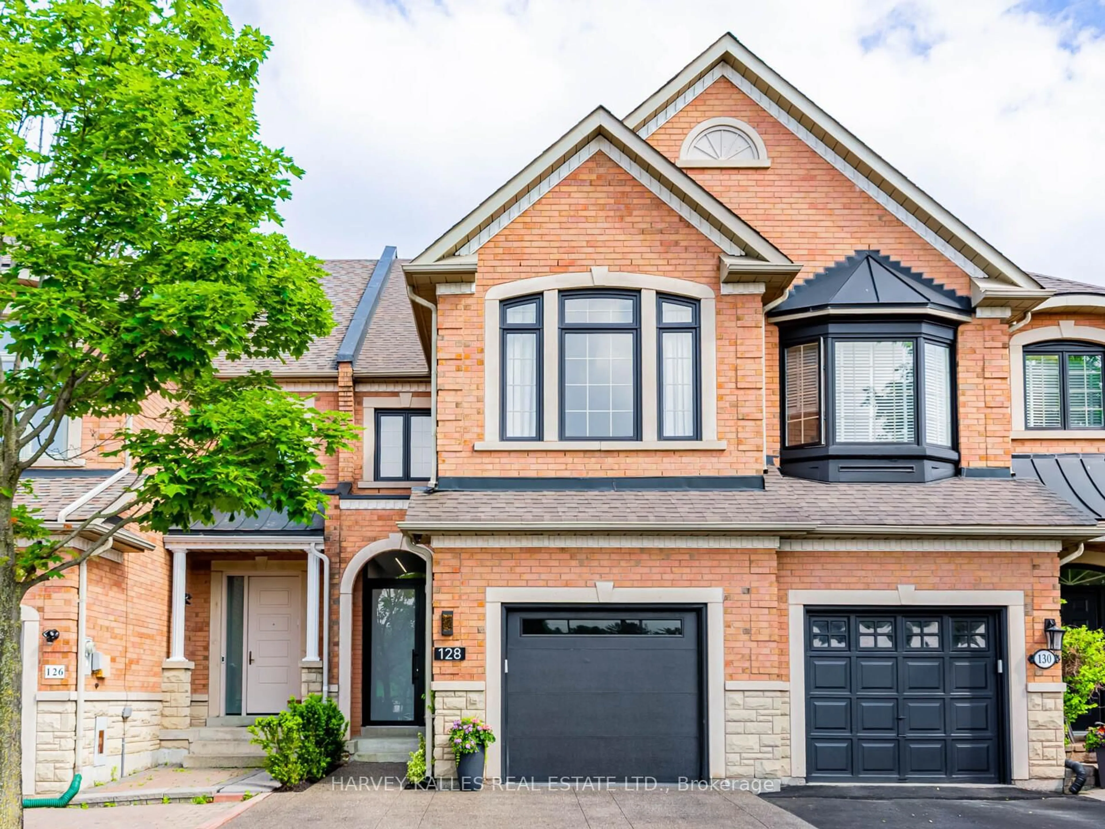 Home with brick exterior material, street for 128 Kingsbridge Circ, Vaughan Ontario L4J 8P2