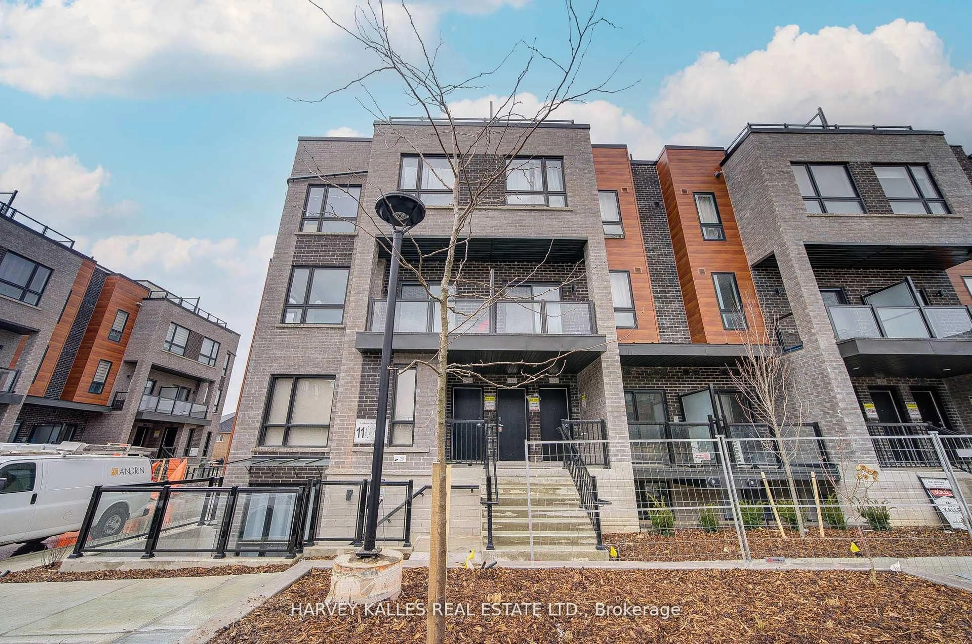 Home with brick exterior material, street for 12-24 Lytham Green Circ #257, Newmarket Ontario L3Y 0H4