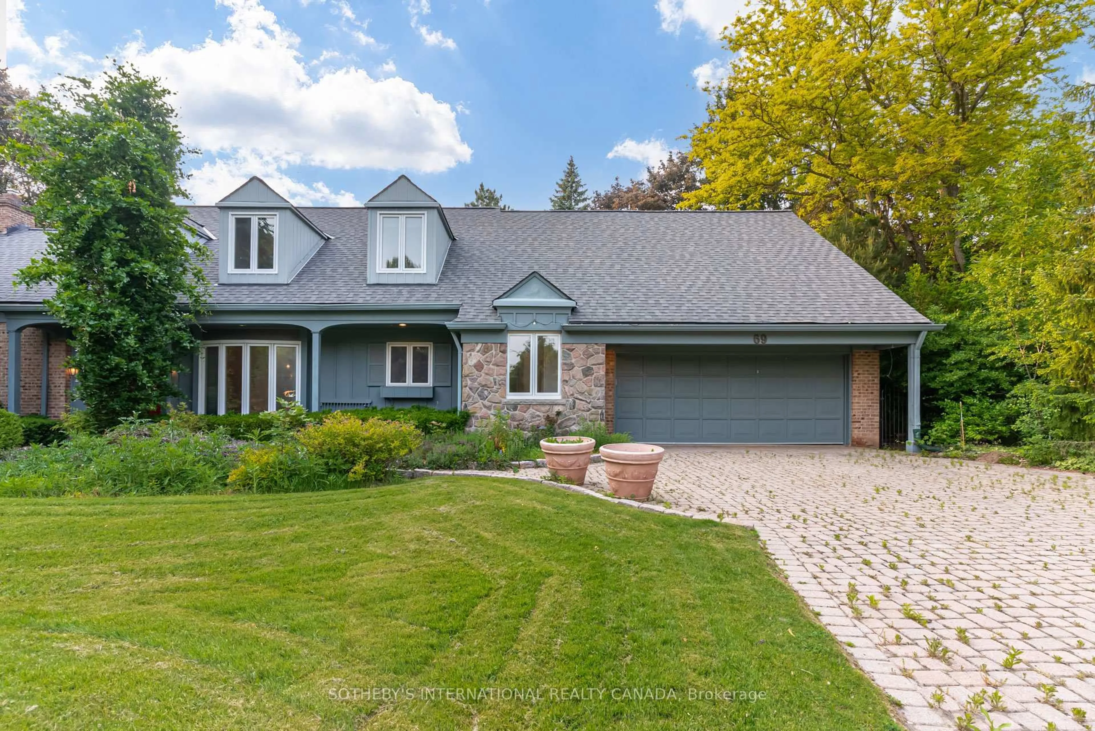 Home with brick exterior material, street for 69 Fairway Heights Dr, Markham Ontario L3T 3A7