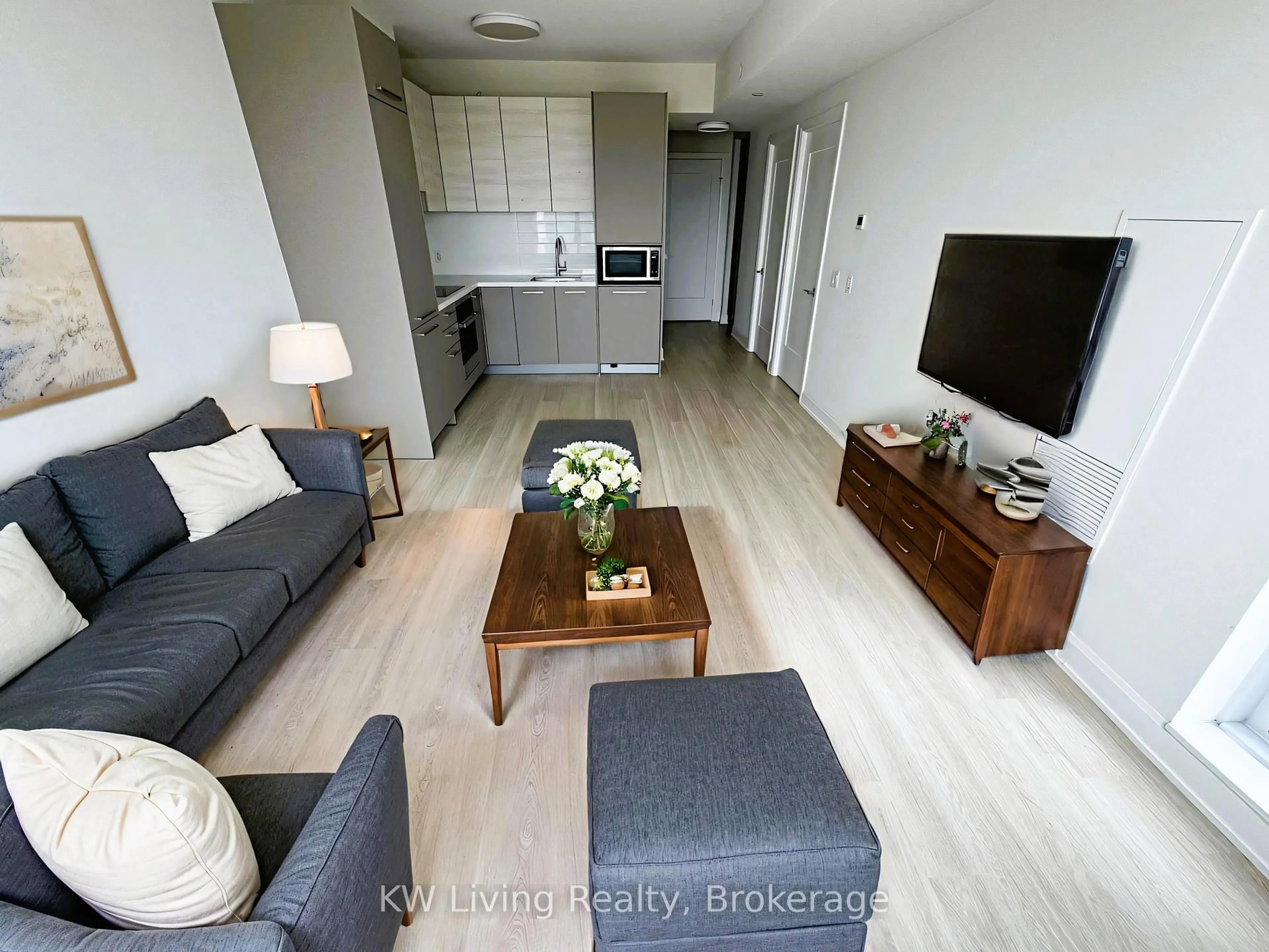 Living room with furniture, wood/laminate floor for 12 Gandhi Lane #2601, Markham Ontario L3T 0G8
