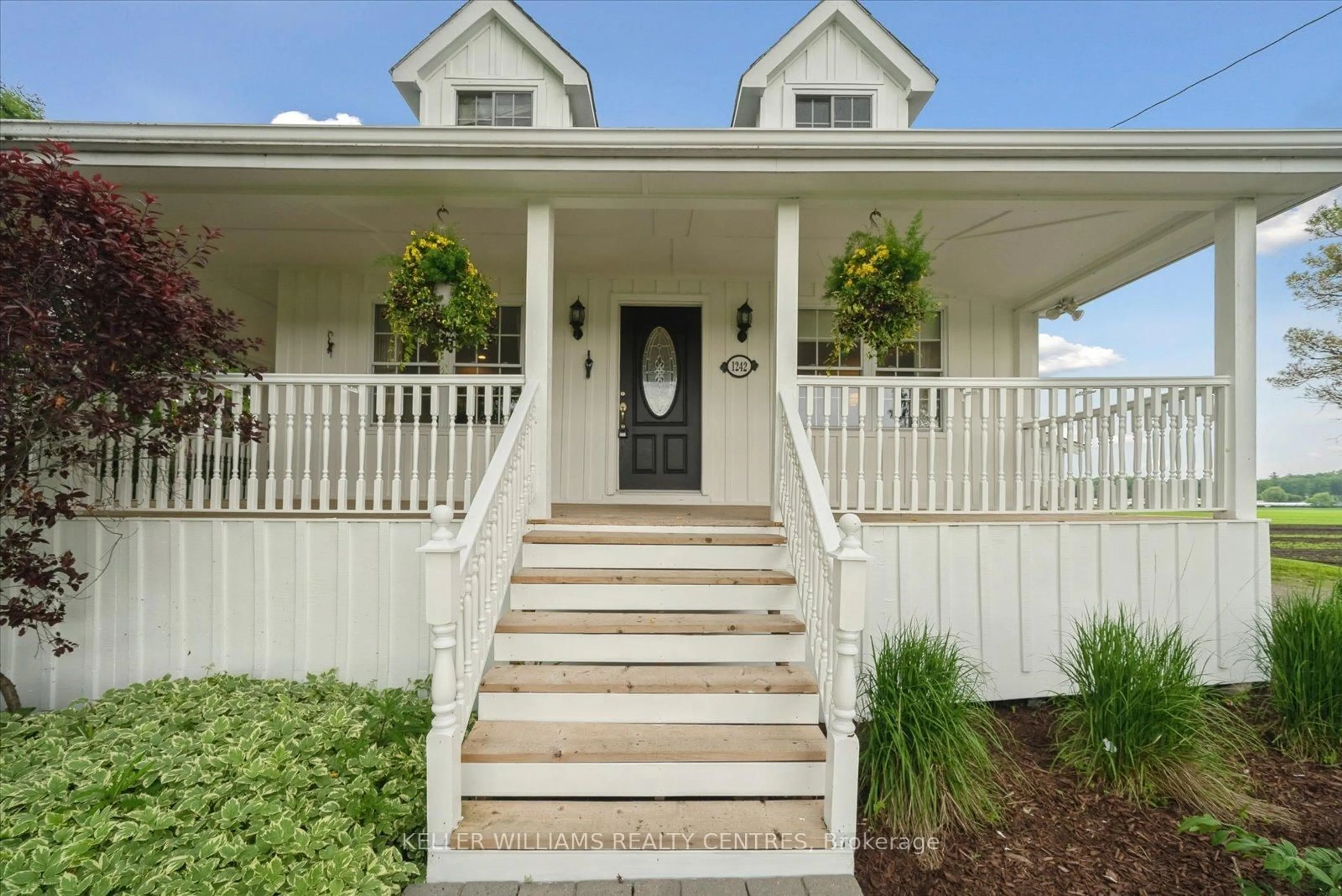 Home with vinyl exterior material, street for 1242 River Rd, Bradford West Gwillimbury Ontario L9N 1L3