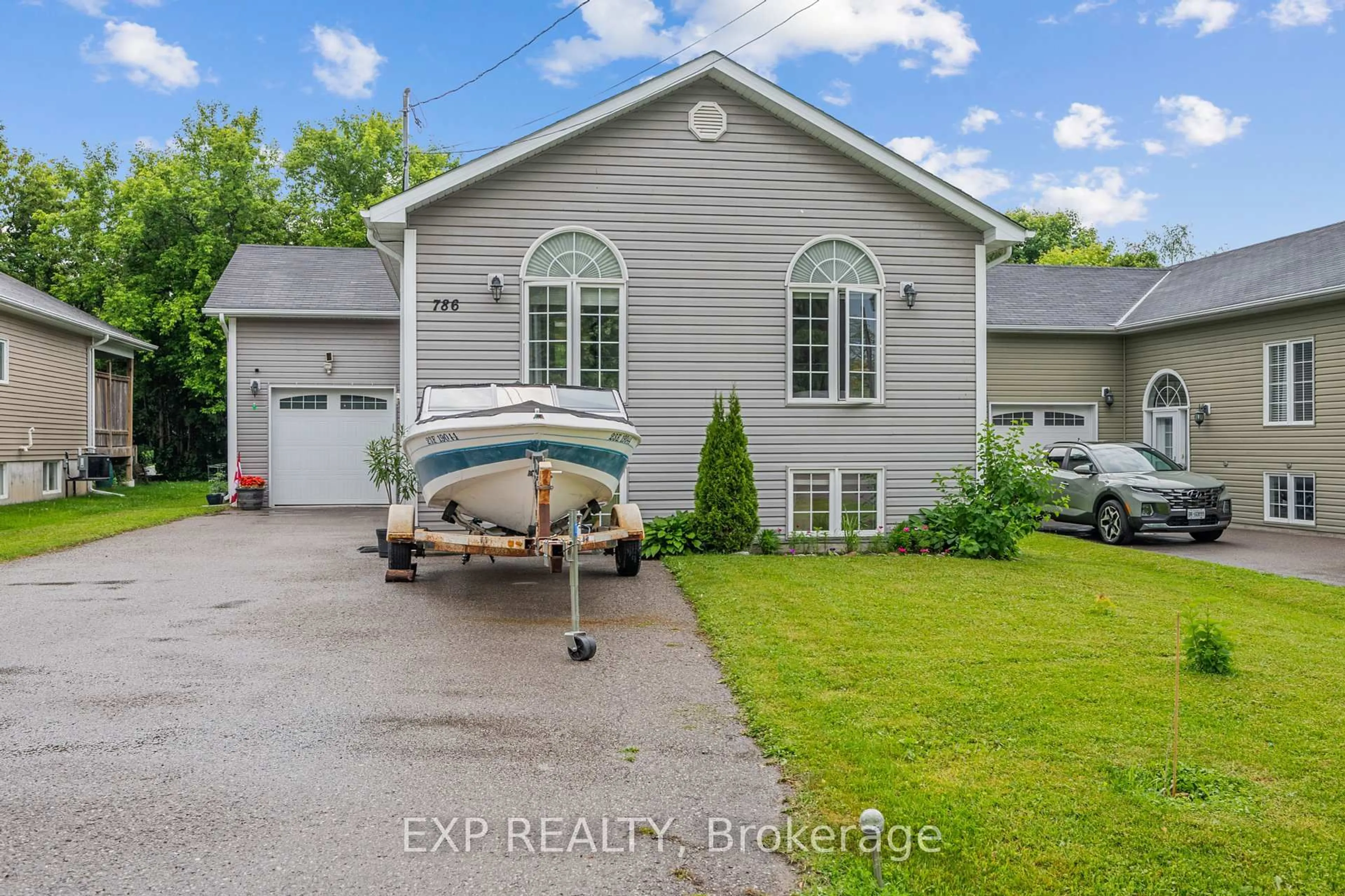 A pic from outside/outdoor area/front of a property/back of a property/a pic from drone, water/lake/river/ocean view for 786 Churchill Lane, Georgina Ontario L0E 1S0