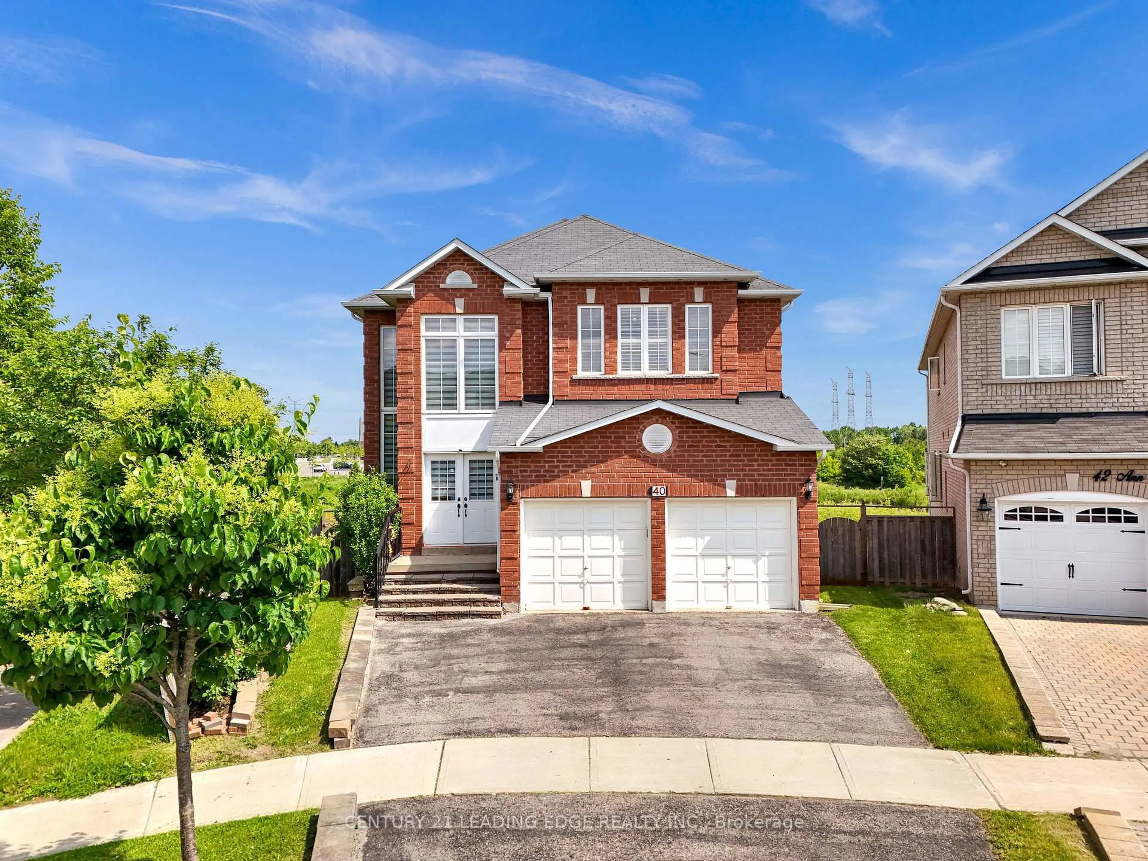 Home with brick exterior material, street for 40 Ann Louise Cres, Markham Ontario L3S 0A8