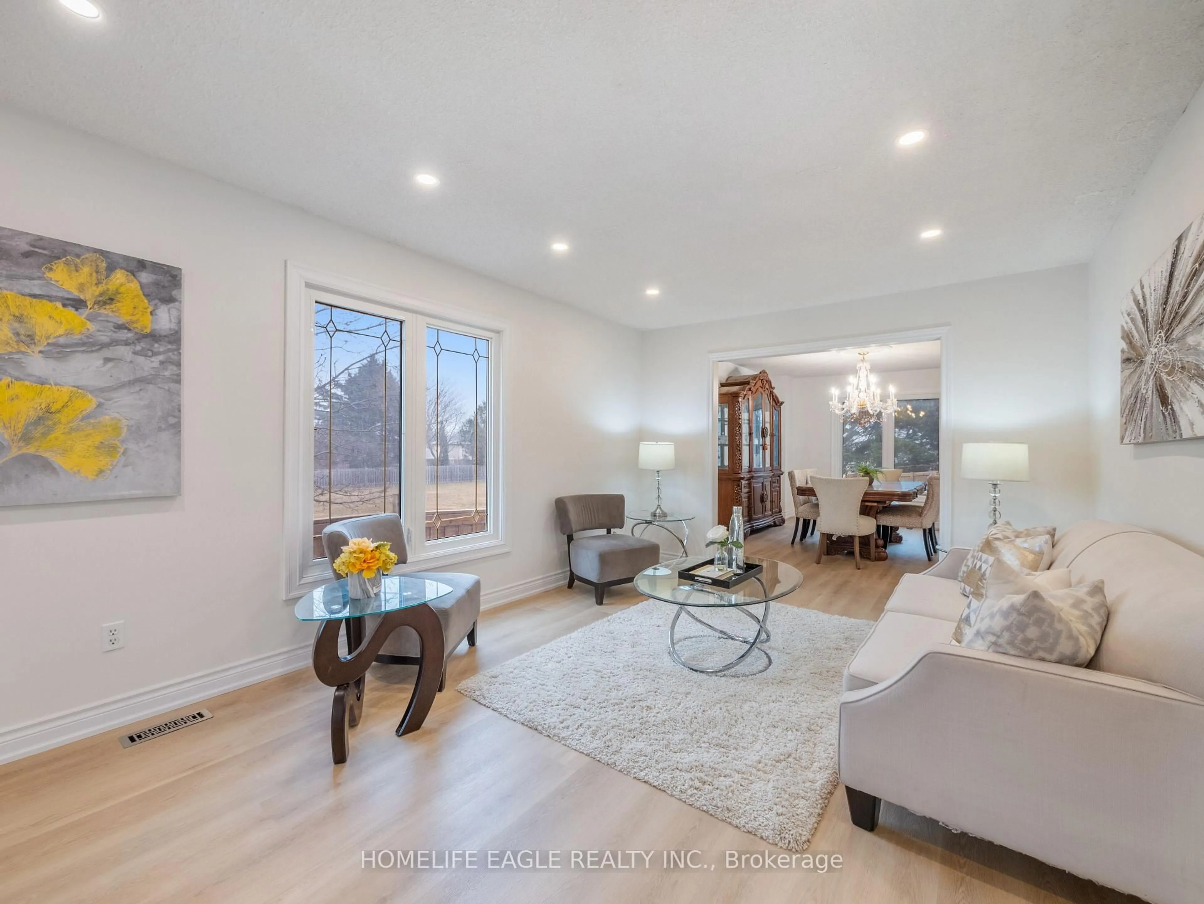 Living room with furniture, wood/laminate floor for 250 Alex Doner Dr, Newmarket Ontario L3X 1A8