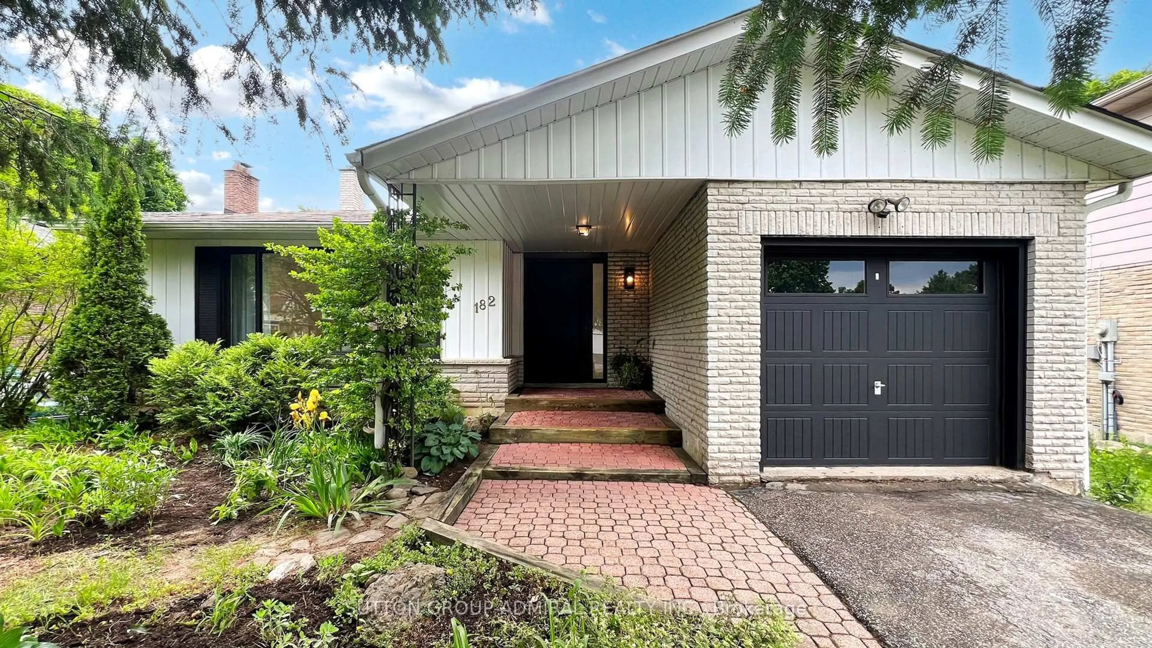 Home with brick exterior material, street for 182 bayview fairways Dr, Markham Ontario L3T 2Y8