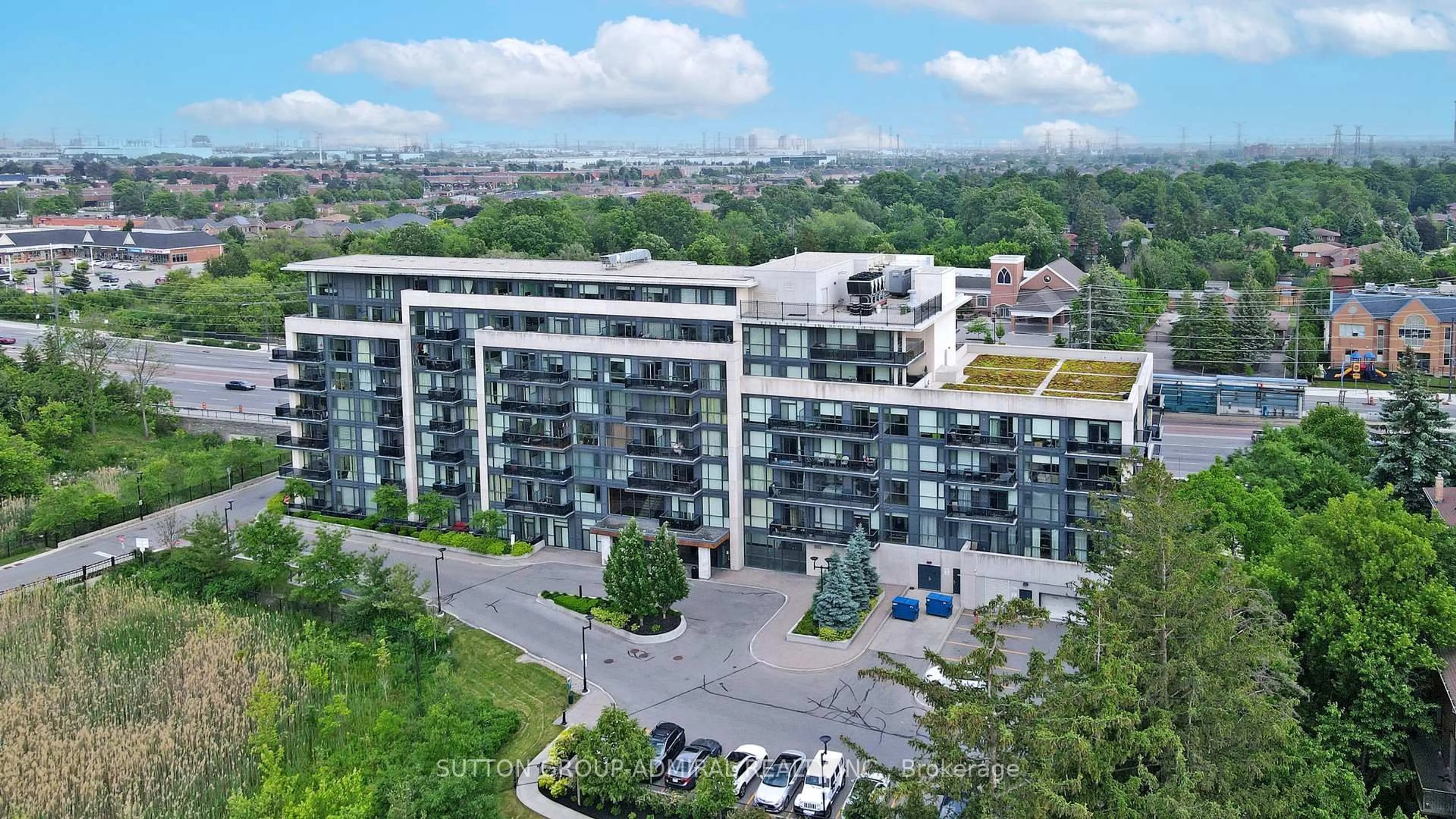 A pic from outside/outdoor area/front of a property/back of a property/a pic from drone, unknown for 4700 Highway 7 St #103, Vaughan Ontario L4L 0B4