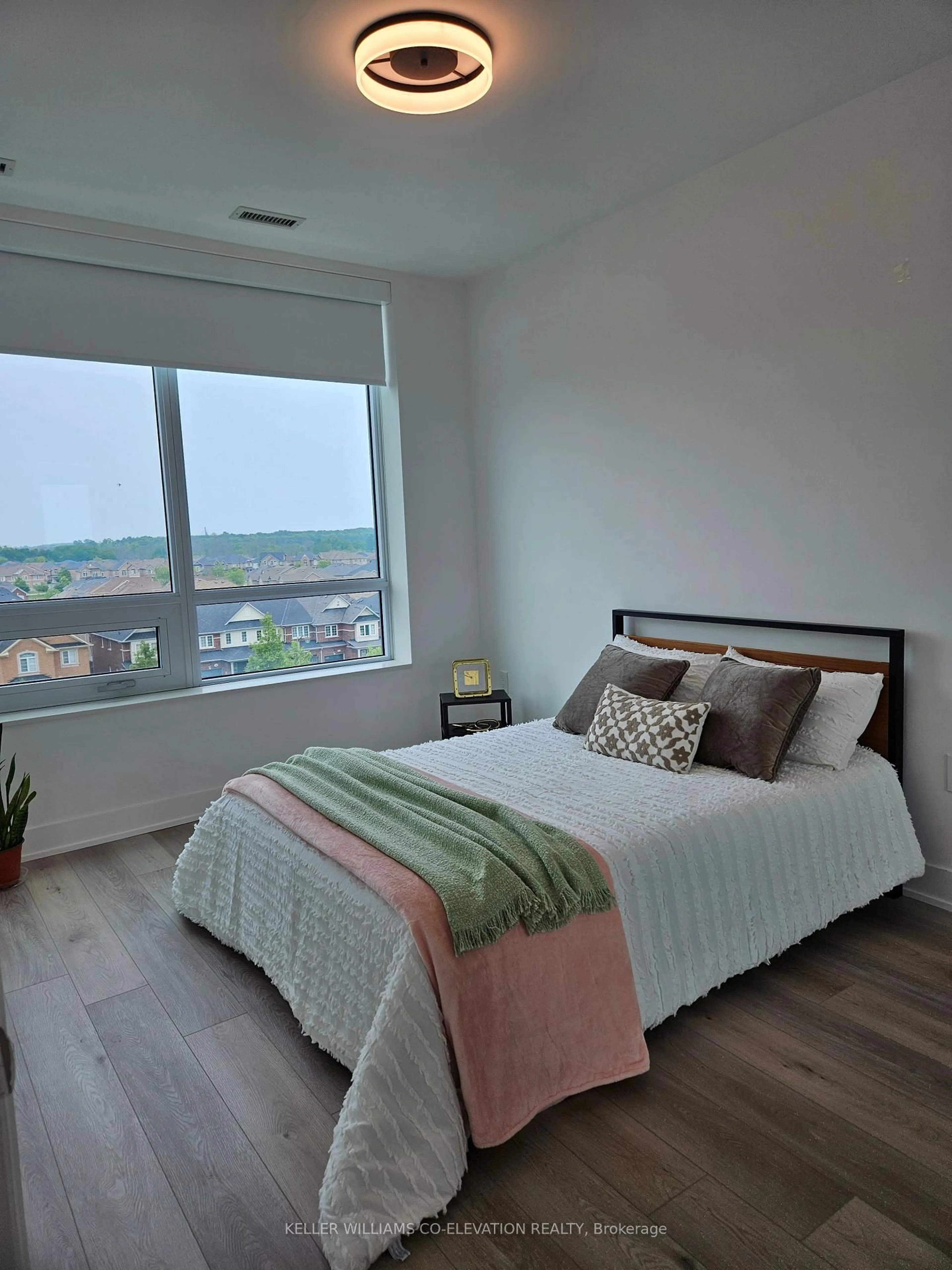 Bedroom with bed, wood/laminate floor for 11750 Ninth Line #625, Whitchurch-Stouffville Ontario L4A 5G1