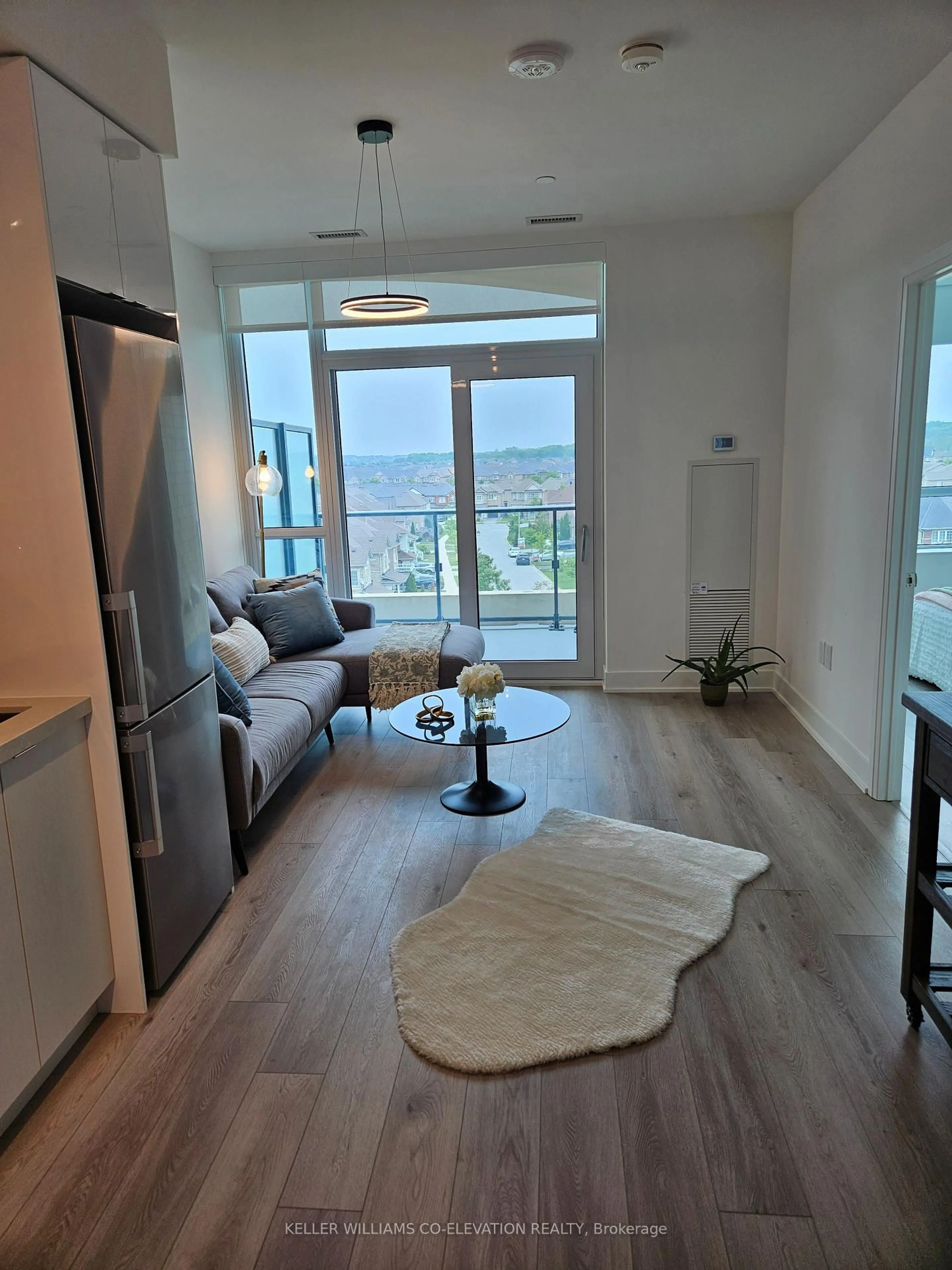 Living room with furniture, wood/laminate floor for 11750 Ninth Line #625, Whitchurch-Stouffville Ontario L4A 5G1