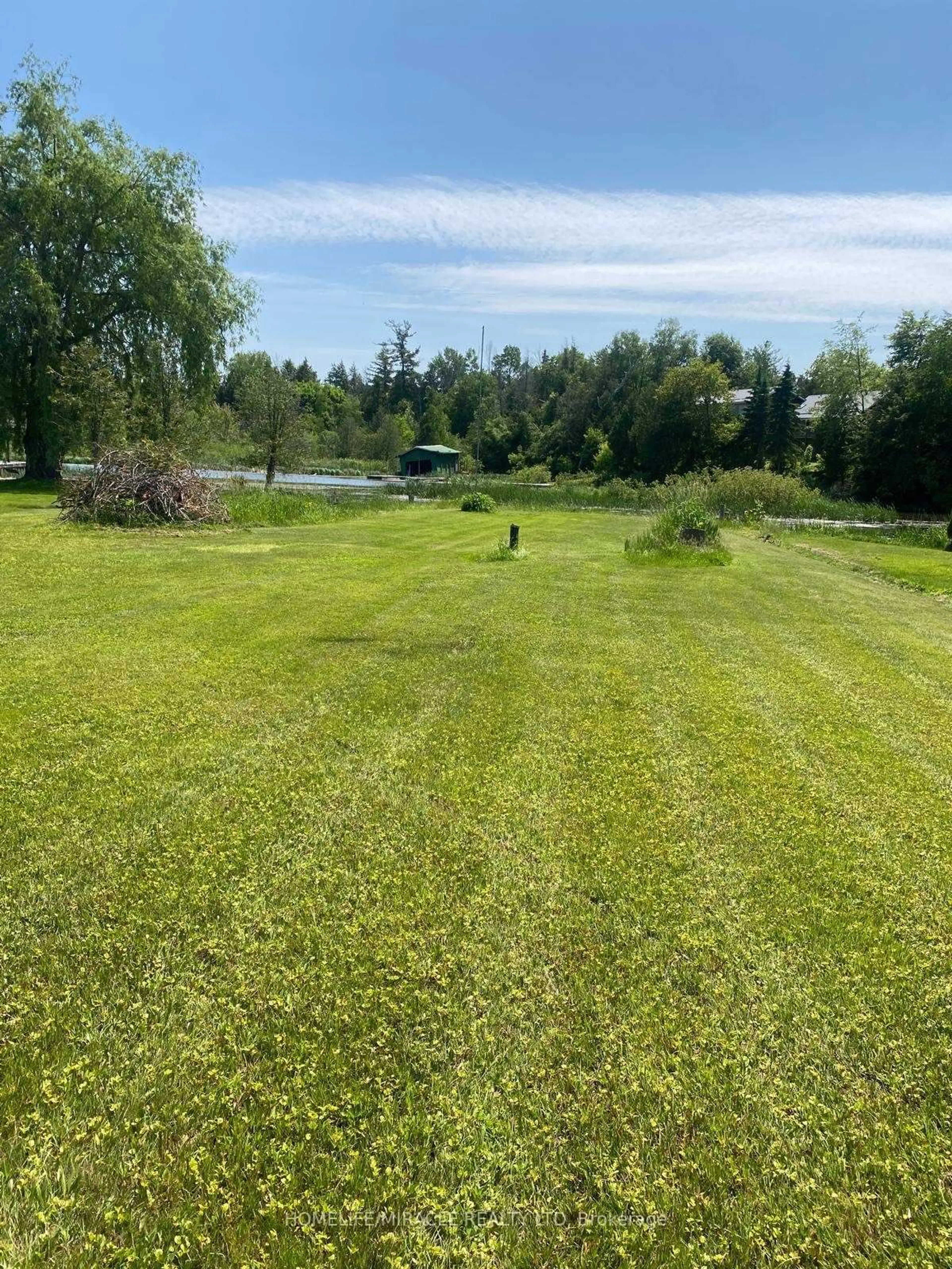 A pic from outside/outdoor area/front of a property/back of a property/a pic from drone, water/lake/river/ocean view for 164 Riverbank Dr, Georgina Ontario L0E 1N0