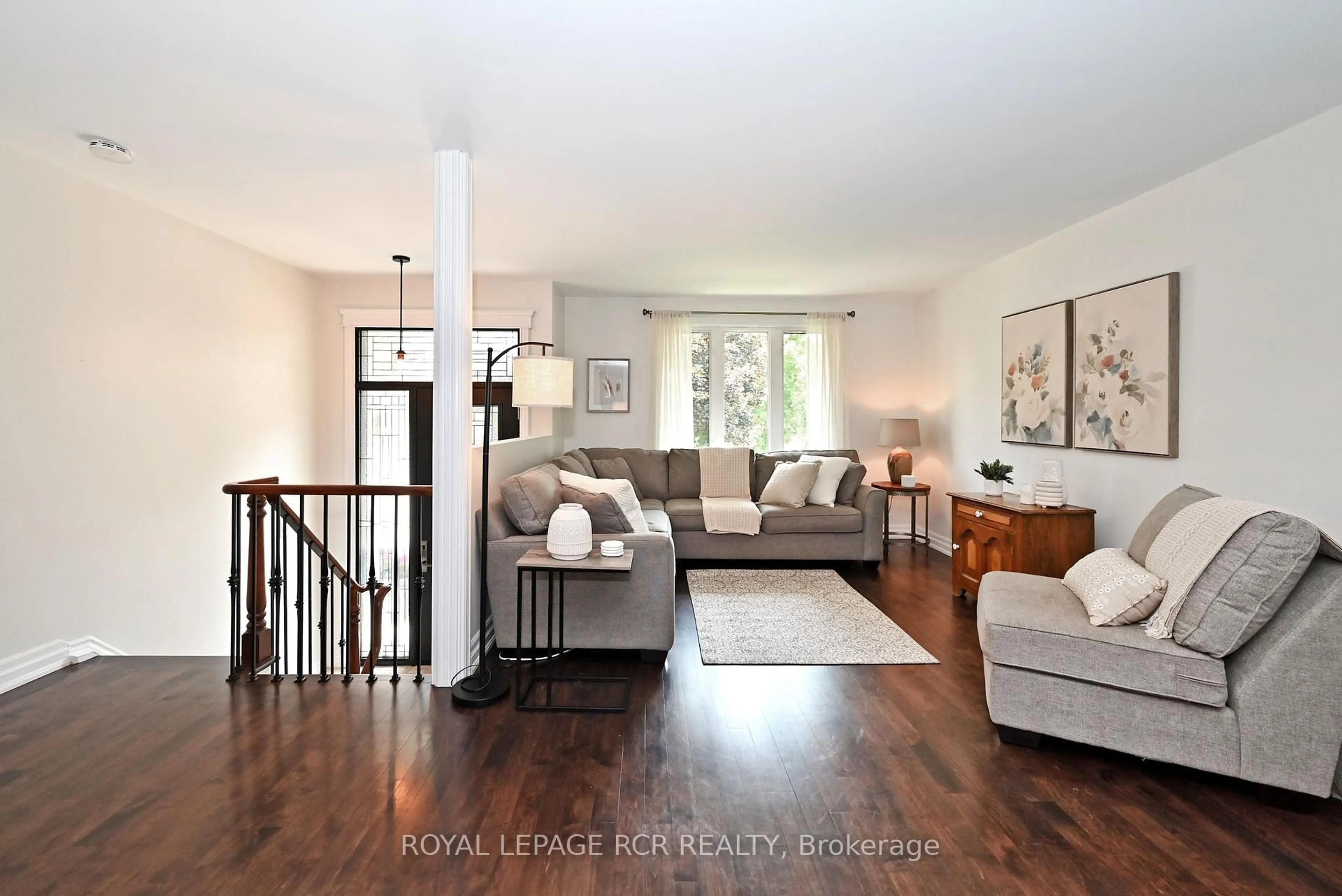 Living room with furniture, wood/laminate floor for 350 Borden Ave, Newmarket Ontario L3Y 5B9