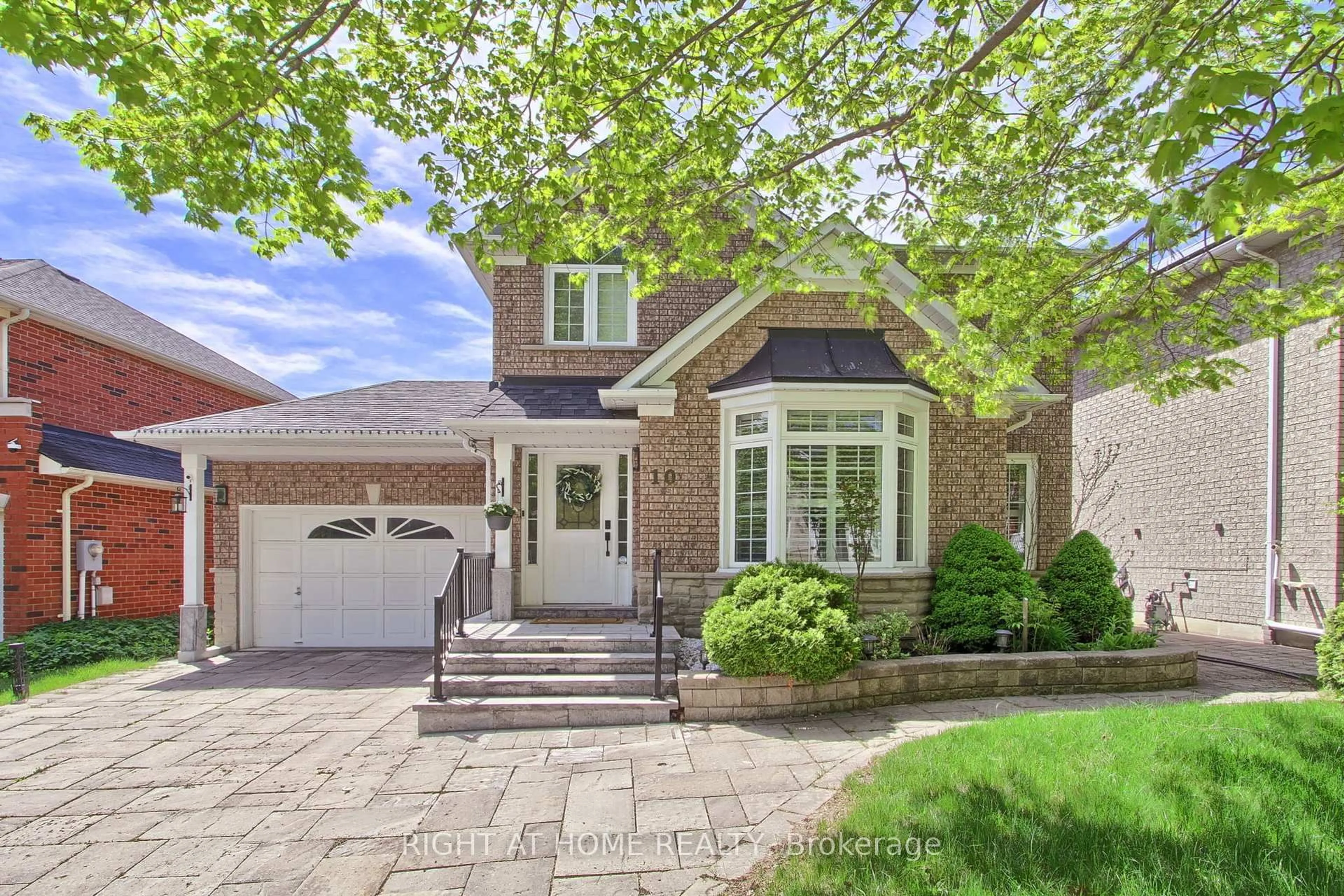 Home with brick exterior material, street for 10 Juneberry Ave, Markham Ontario L3S 4B1