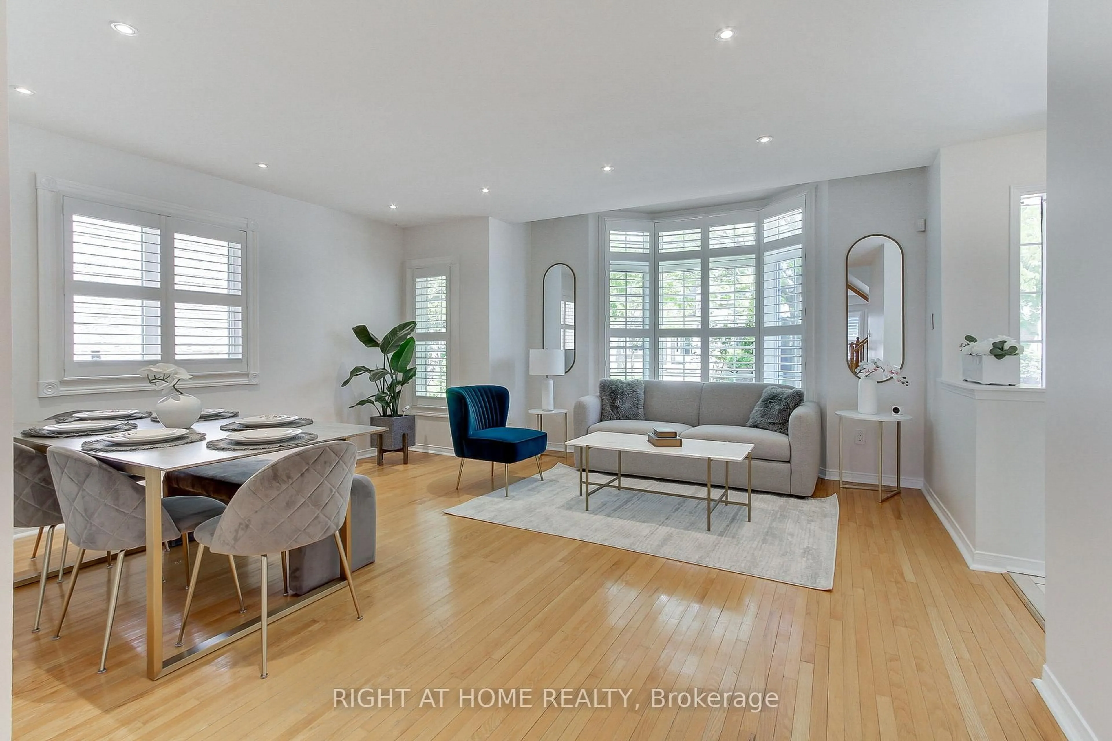 Living room with furniture, wood/laminate floor for 10 Juneberry Ave, Markham Ontario L3S 4B1