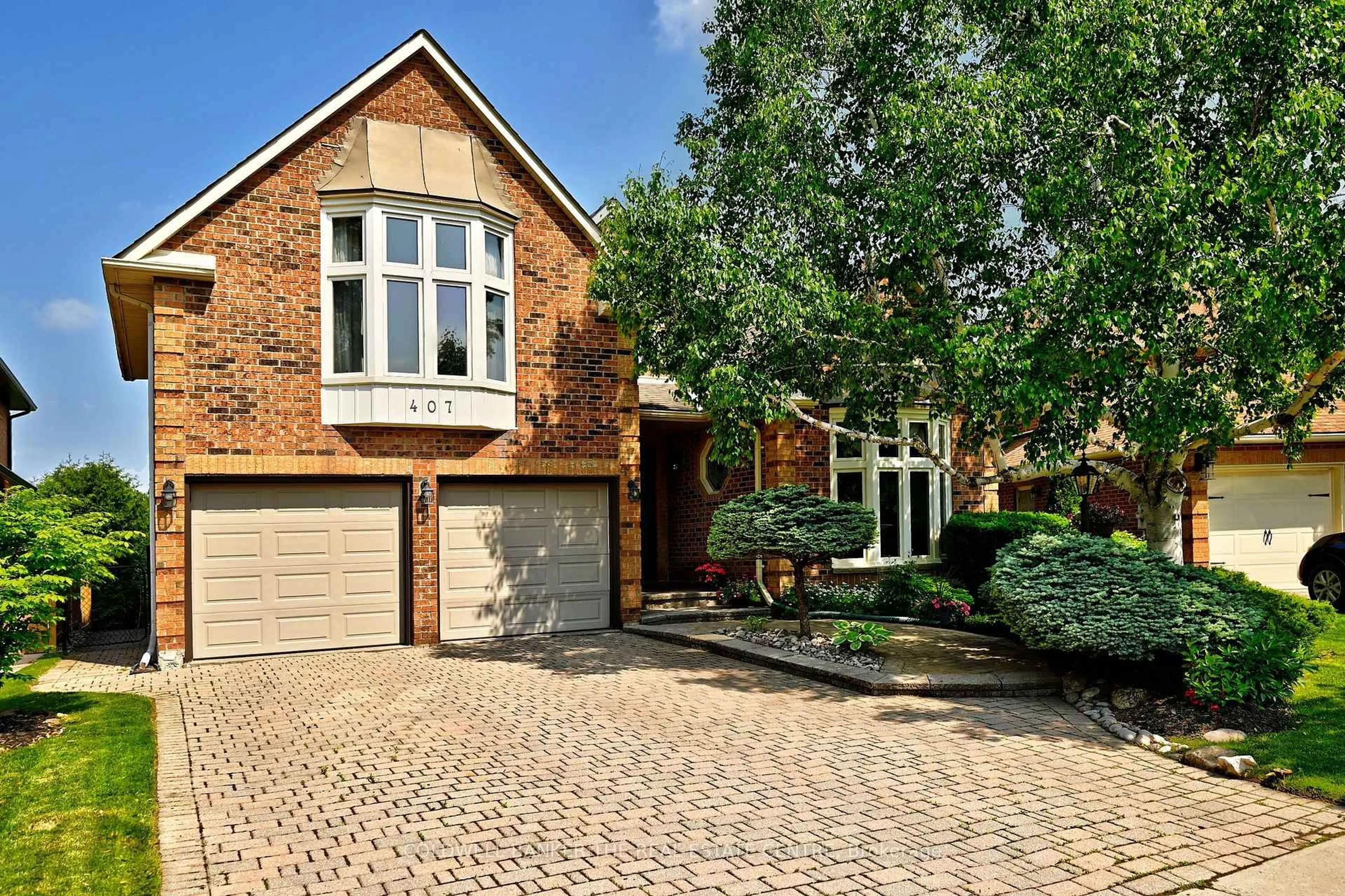Home with brick exterior material, street for 407 Fairway Gdns, Newmarket Ontario L3X 1B7