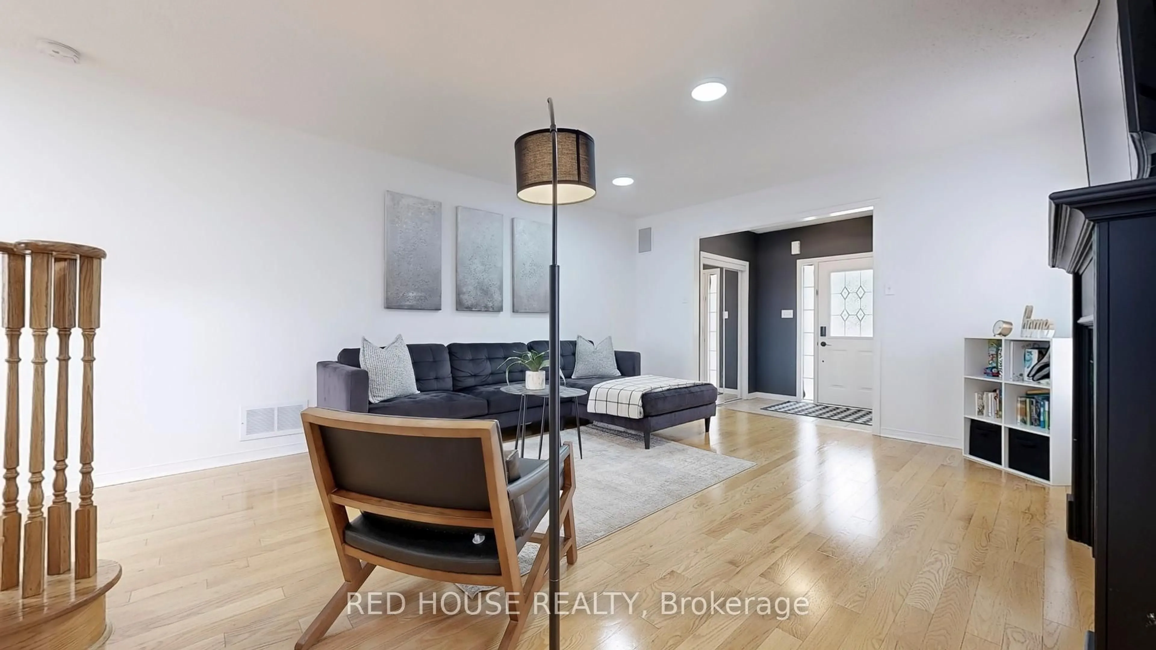 Living room with furniture, wood/laminate floor for 106 Bologna Rd, Vaughan Ontario L4H 2M7