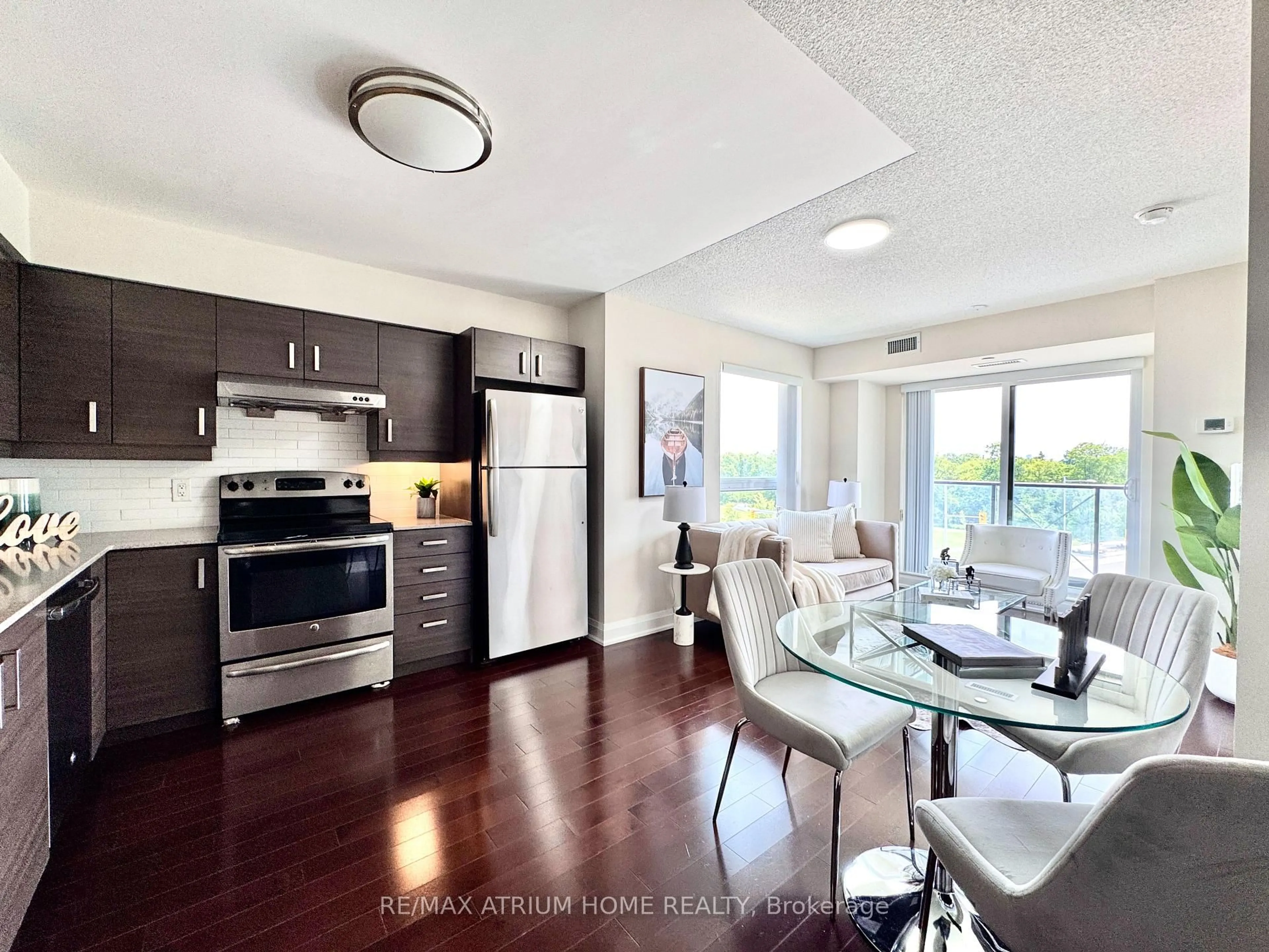 Open concept kitchen, wood/laminate floor for 8200 Birchmount Rd #520, Markham Ontario L3R 9W1