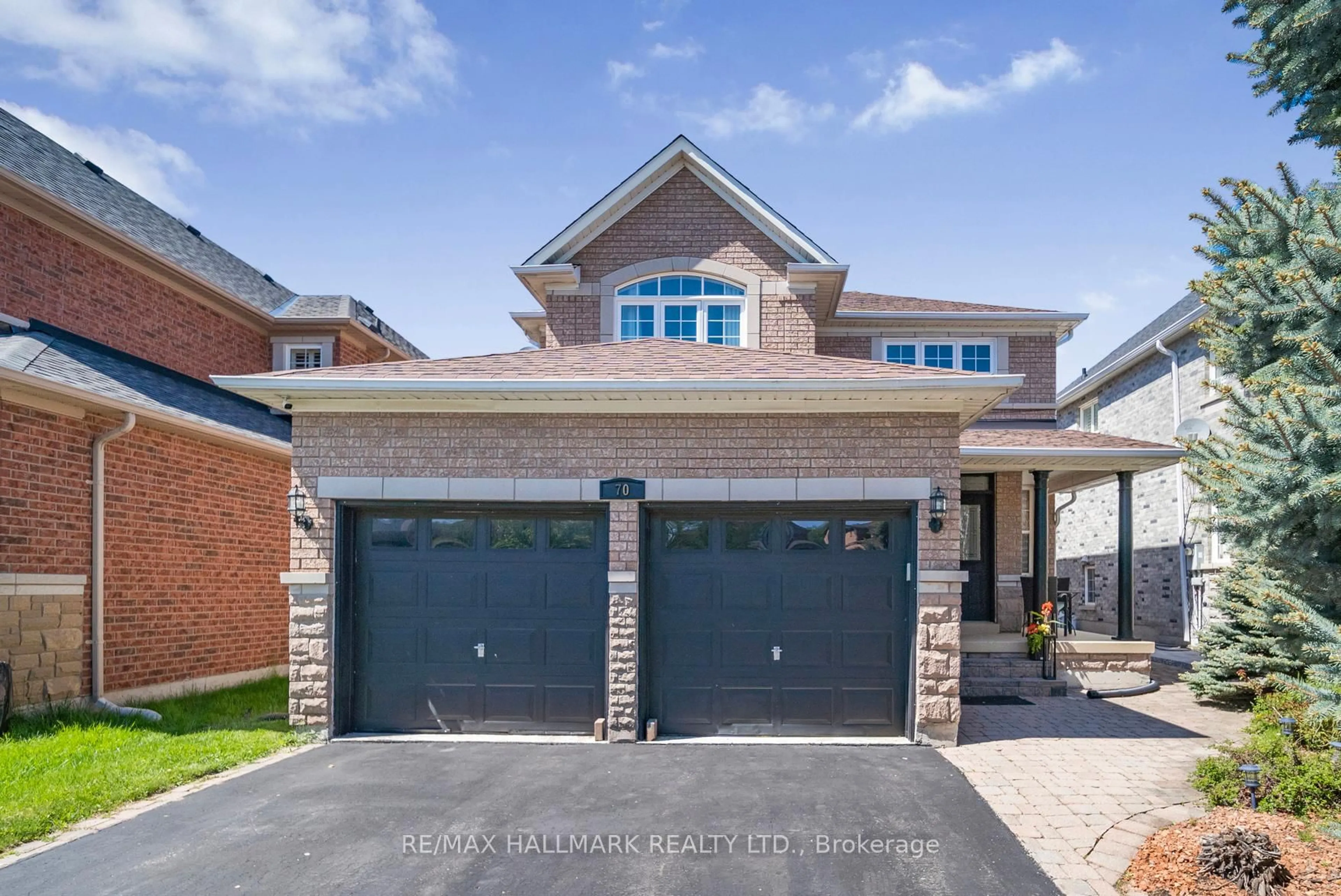 Home with brick exterior material, street for 70 Deerwood Cres, Richmond Hill Ontario L4E 4B4