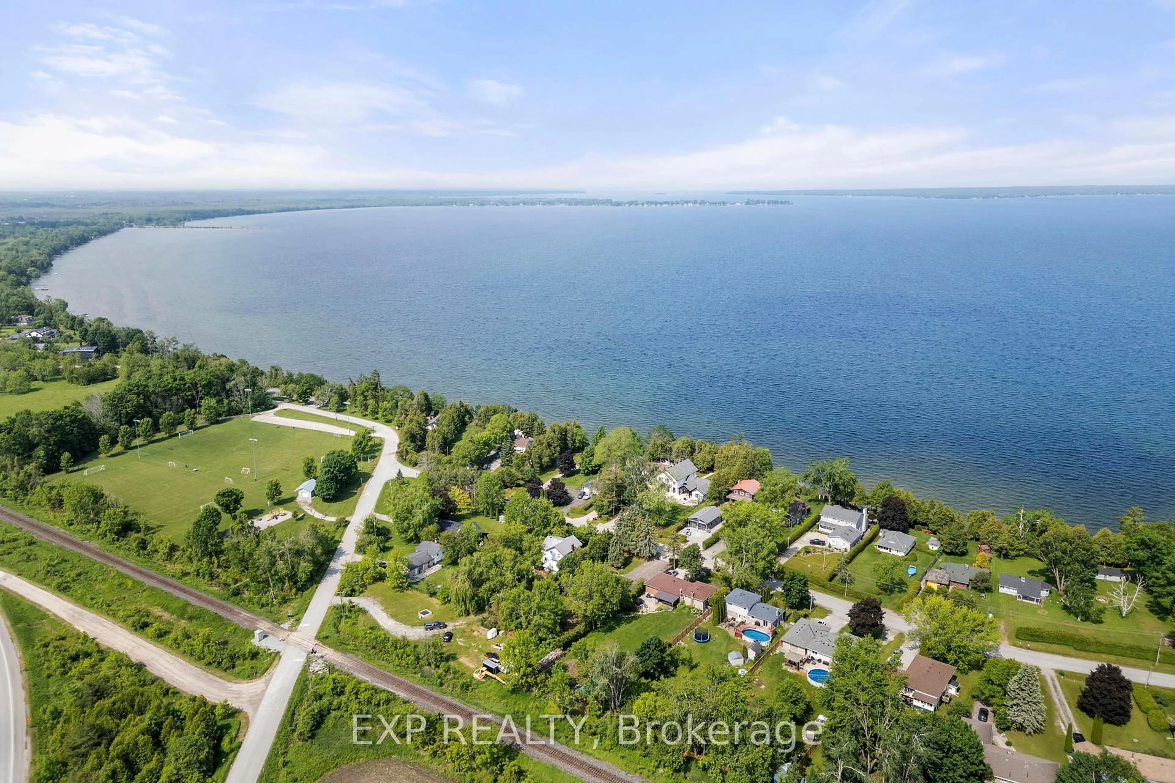 A pic from outside/outdoor area/front of a property/back of a property/a pic from drone, water/lake/river/ocean view for 24115 Thorah Park Blvd, Brock Ontario L0K 1A0