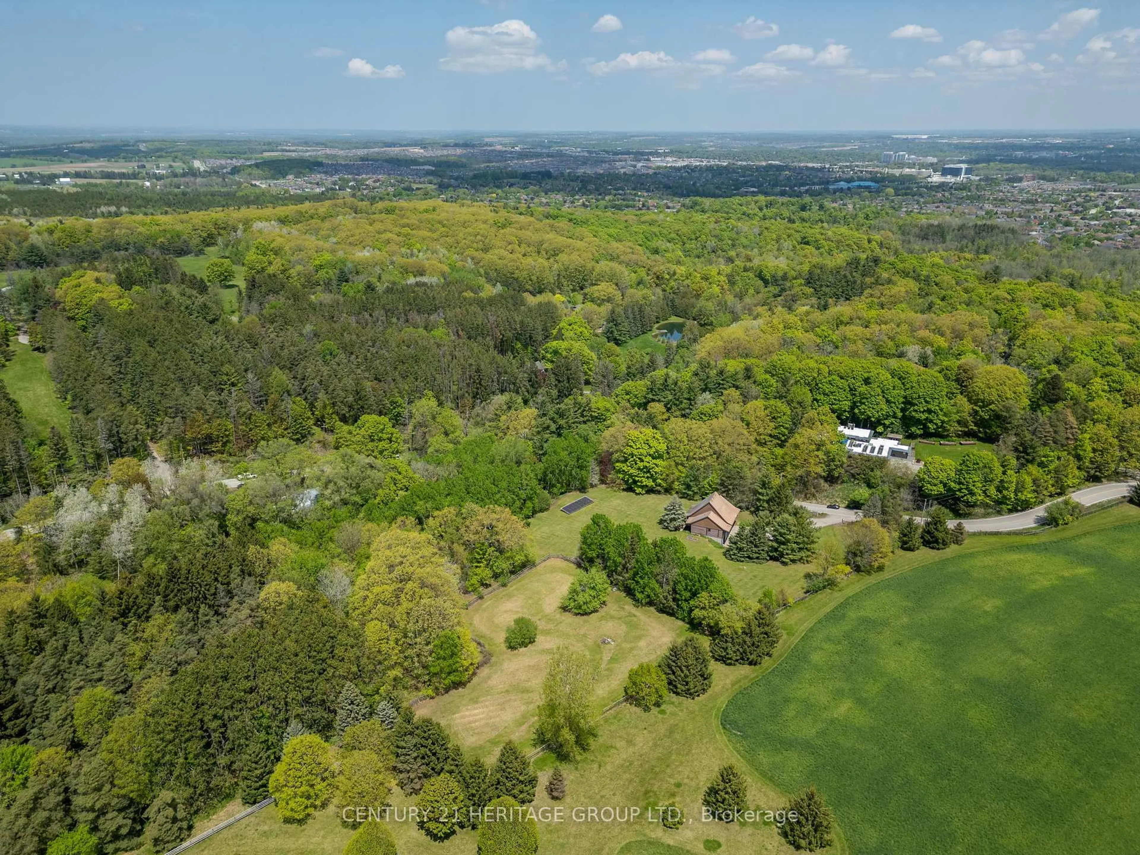 A pic from outside/outdoor area/front of a property/back of a property/a pic from drone, forest/trees view for 300 Old Bathurst St, King Ontario L7B 1K5