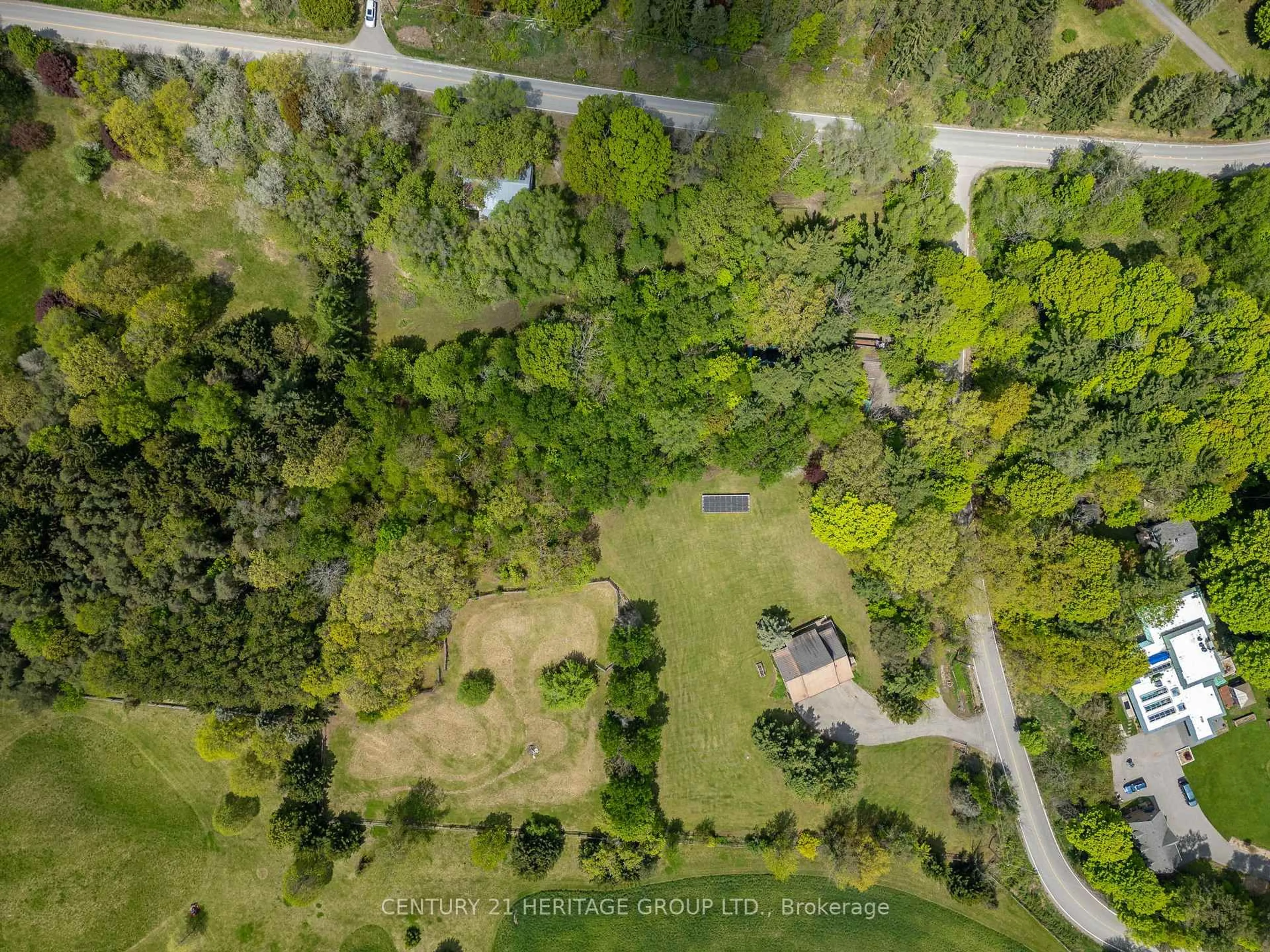 A pic from outside/outdoor area/front of a property/back of a property/a pic from drone, forest/trees view for 300 Old Bathurst St, King Ontario L7B 1K5