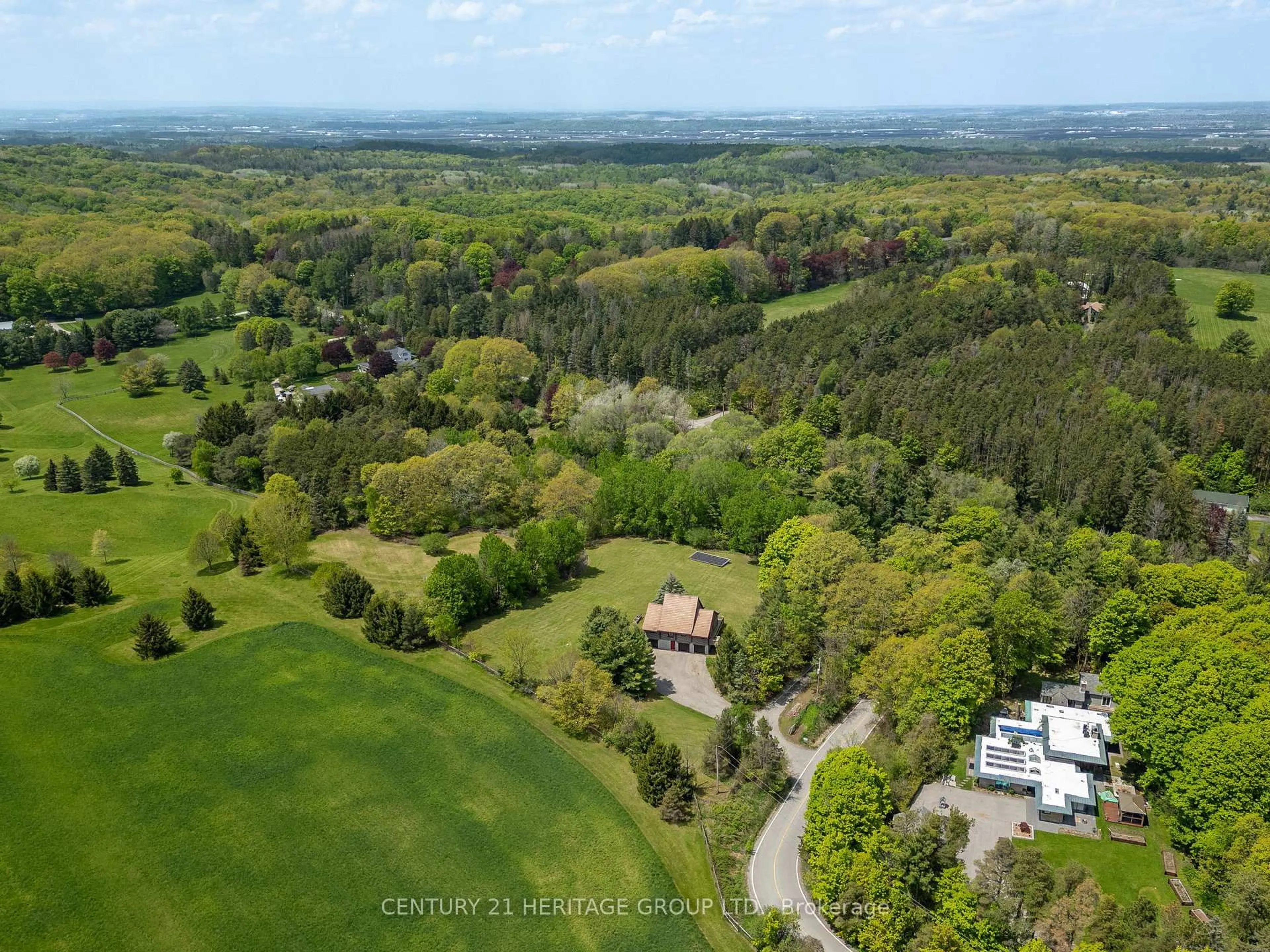 A pic from outside/outdoor area/front of a property/back of a property/a pic from drone, forest/trees view for 300 Old Bathurst St, King Ontario L7B 1K5