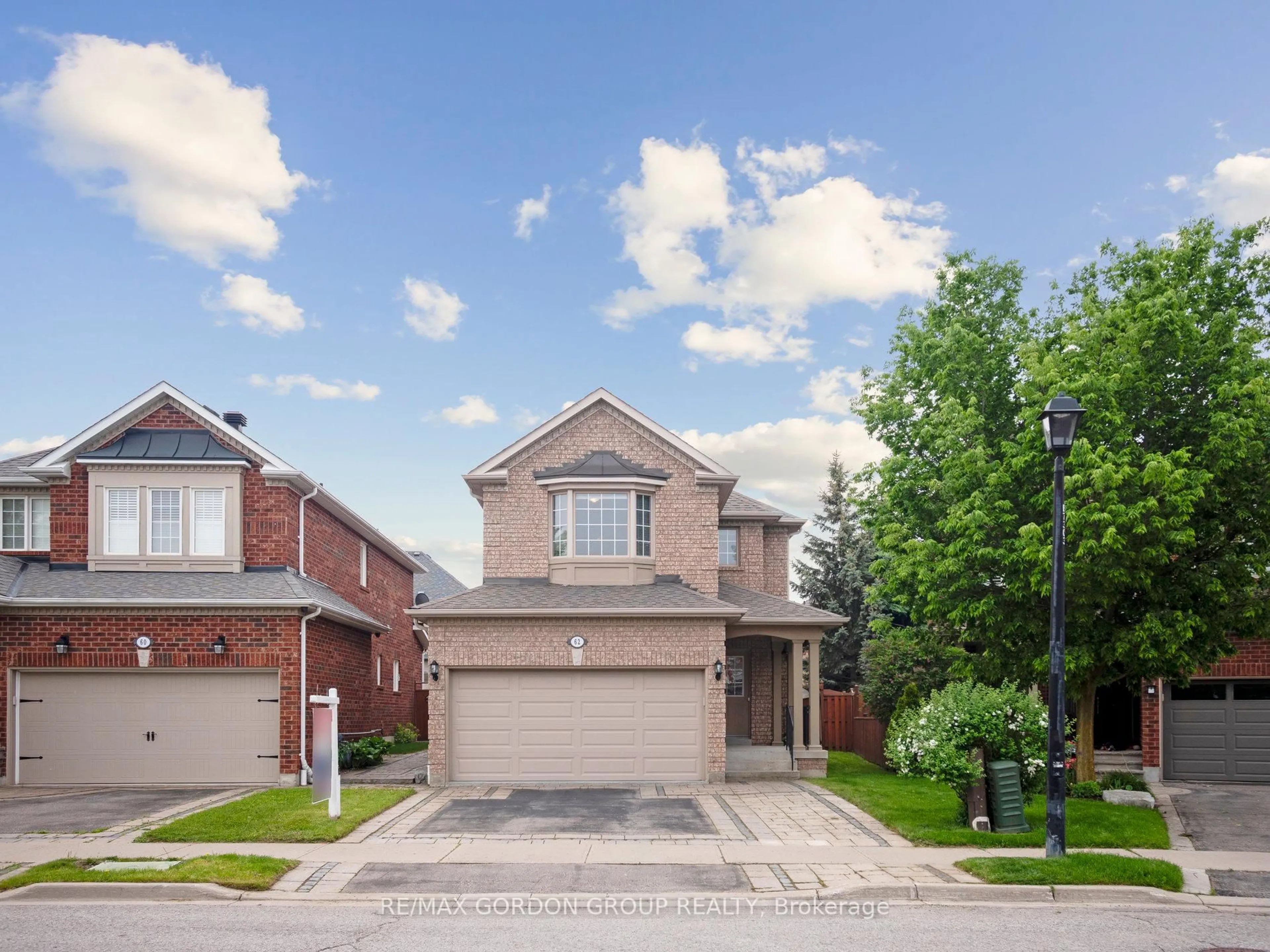 Home with brick exterior material, street for 62 Macedonia Crt, Newmarket Ontario L3X 2W8