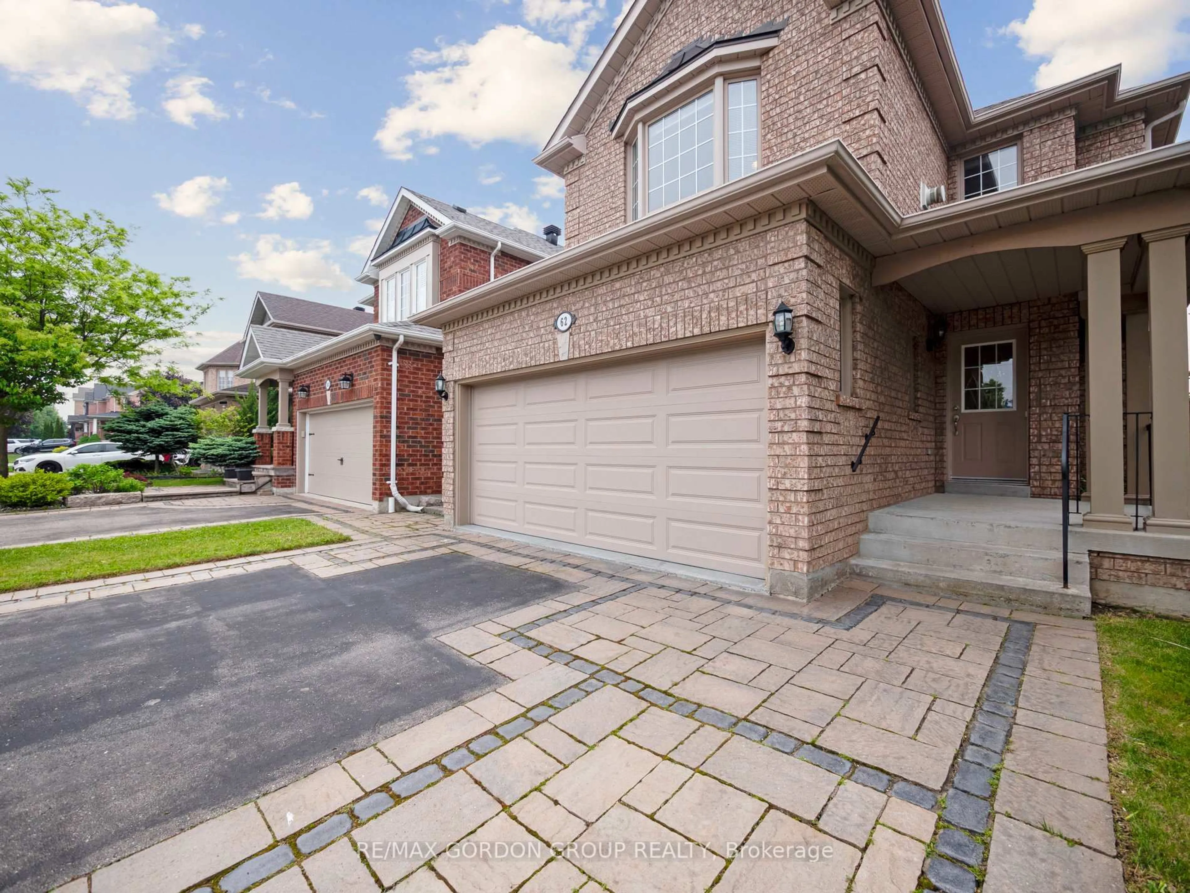 Home with brick exterior material, street for 62 Macedonia Crt, Newmarket Ontario L3X 2W8