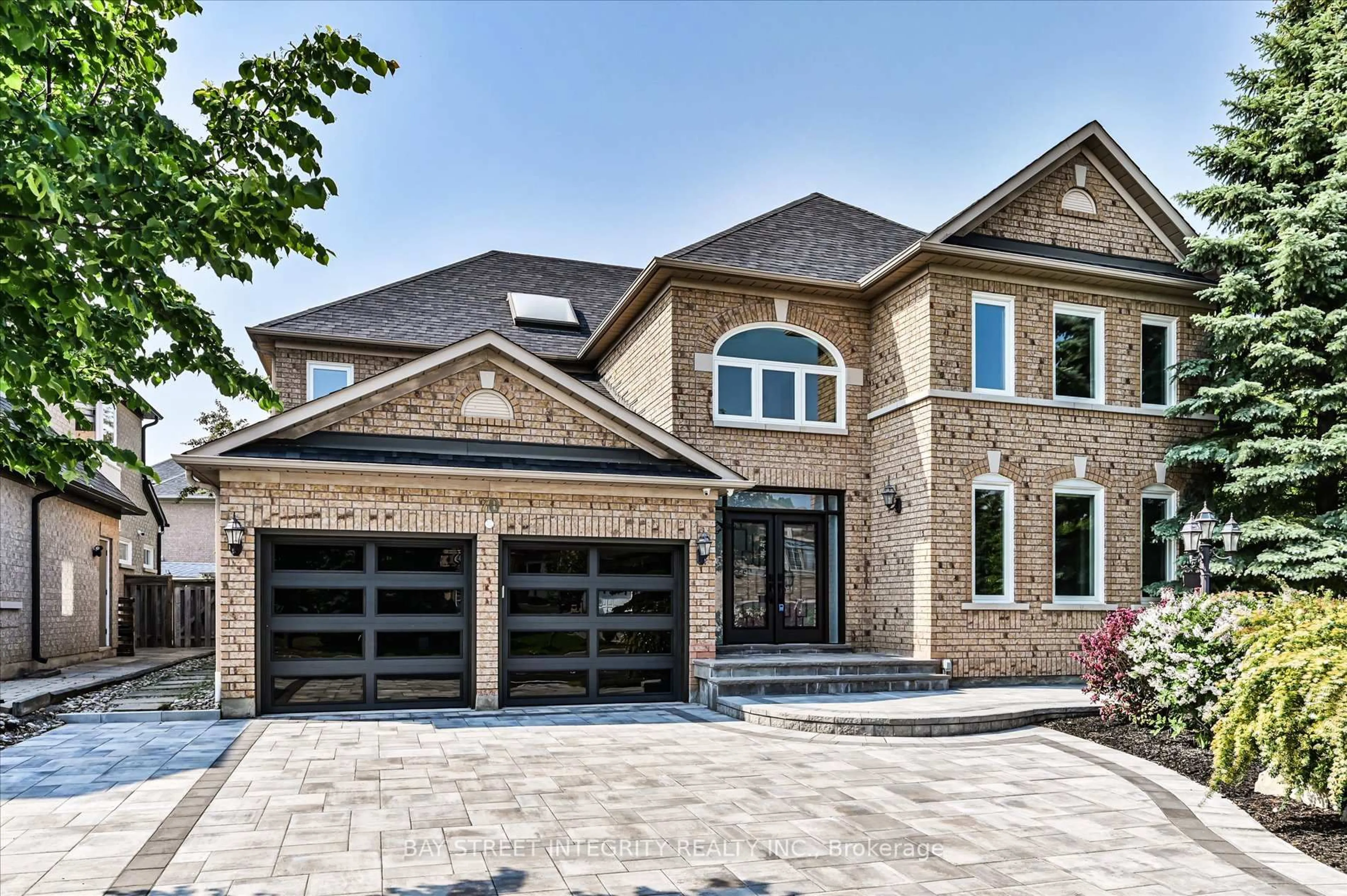 Home with brick exterior material, street for 70 Macrill Rd, Markham Ontario L6C 1W7