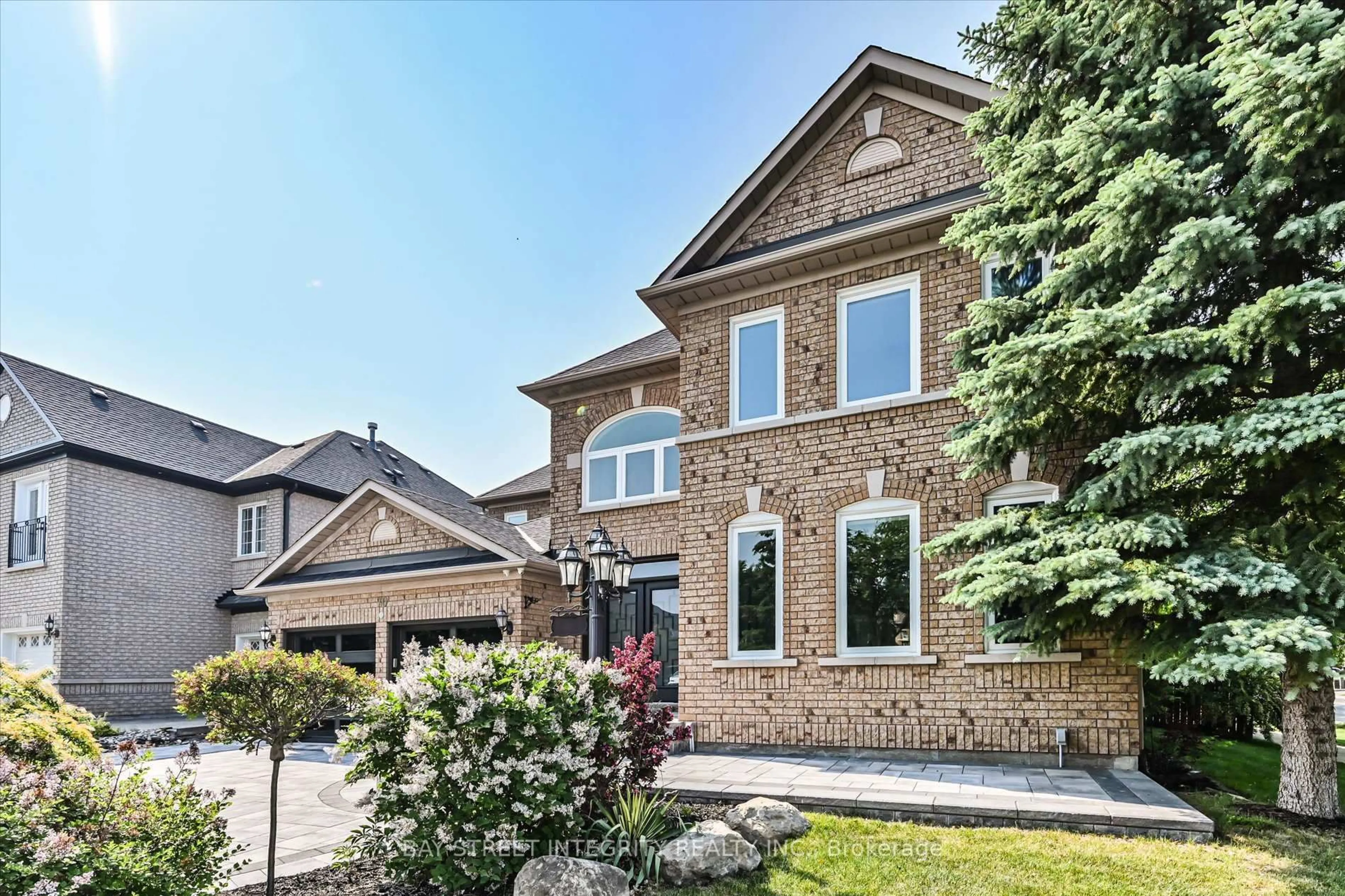 Home with brick exterior material, street for 70 Macrill Rd, Markham Ontario L6C 1W7