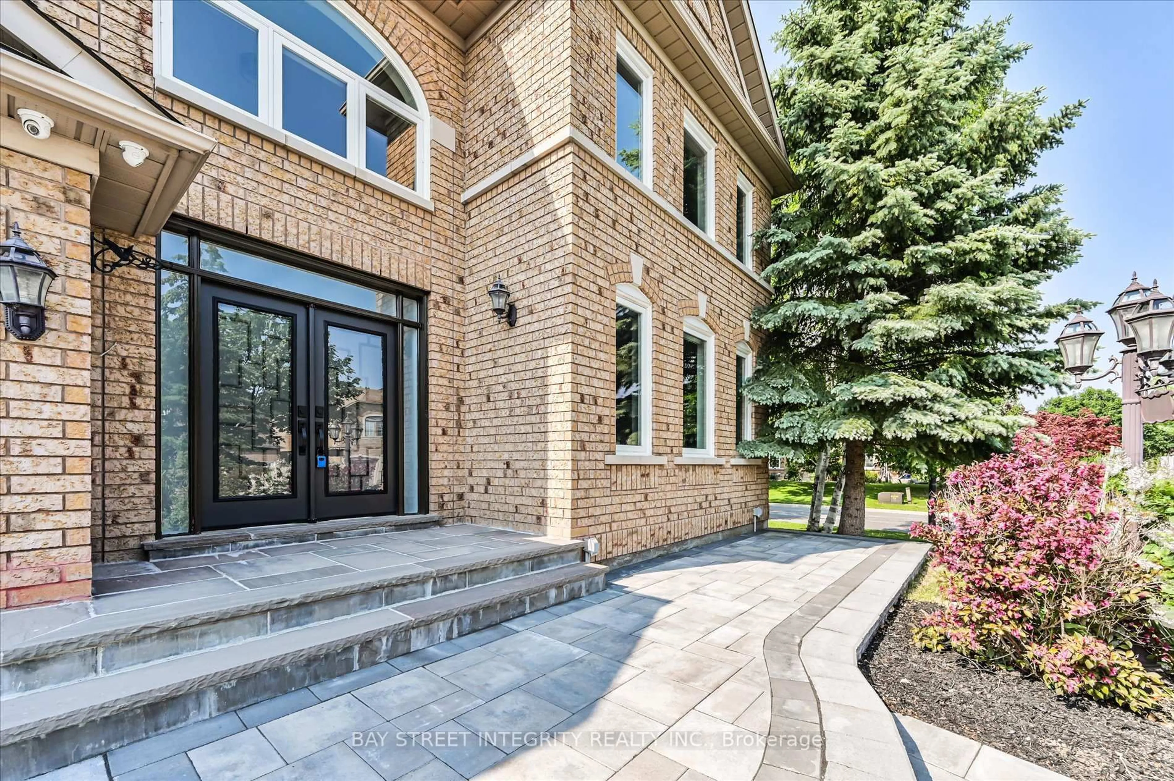 Home with brick exterior material, street for 70 Macrill Rd, Markham Ontario L6C 1W7