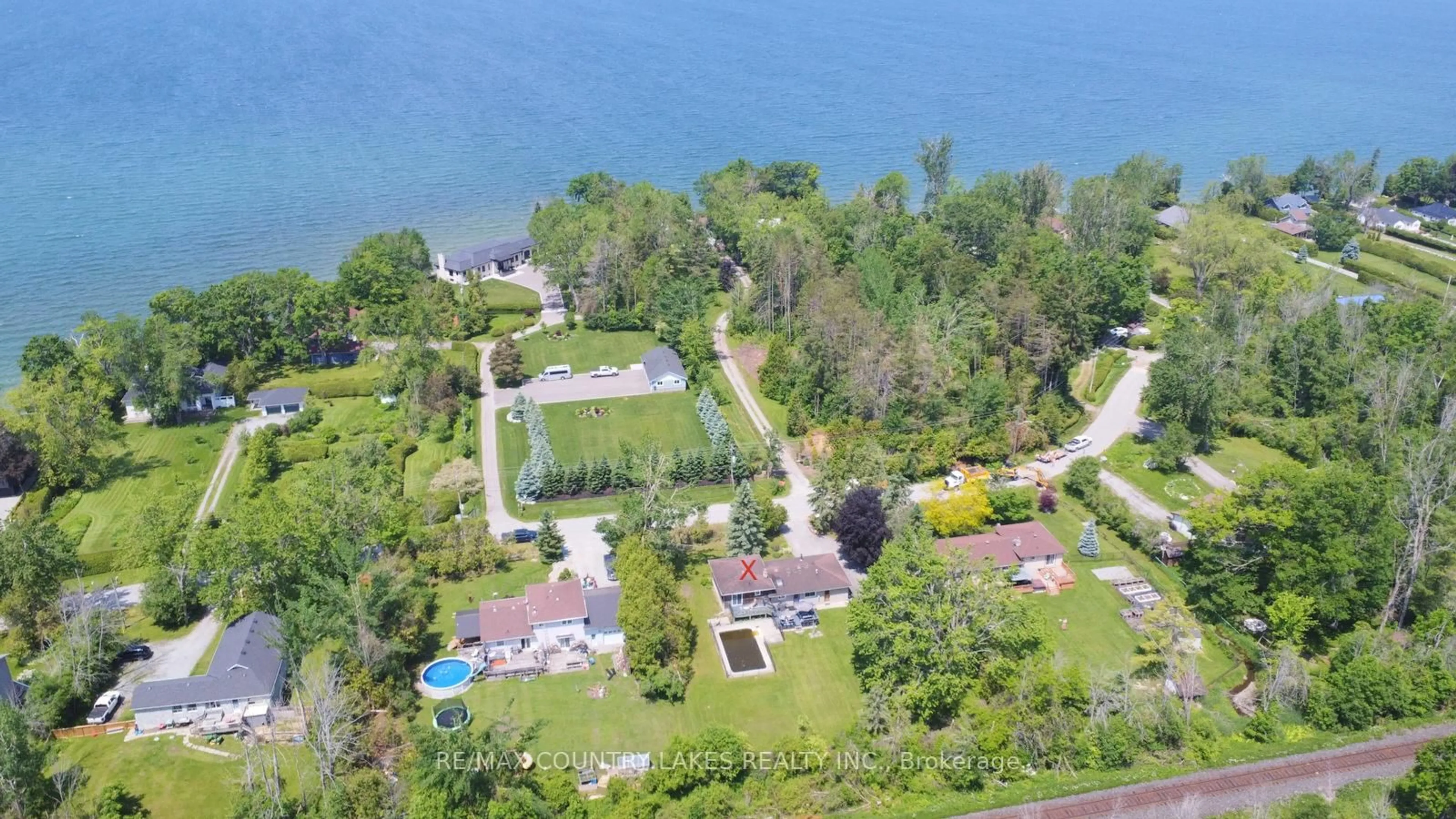 A pic from outside/outdoor area/front of a property/back of a property/a pic from drone, water/lake/river/ocean view for 25725 Maple Beach Rd, Brock Ontario L0K 1A0