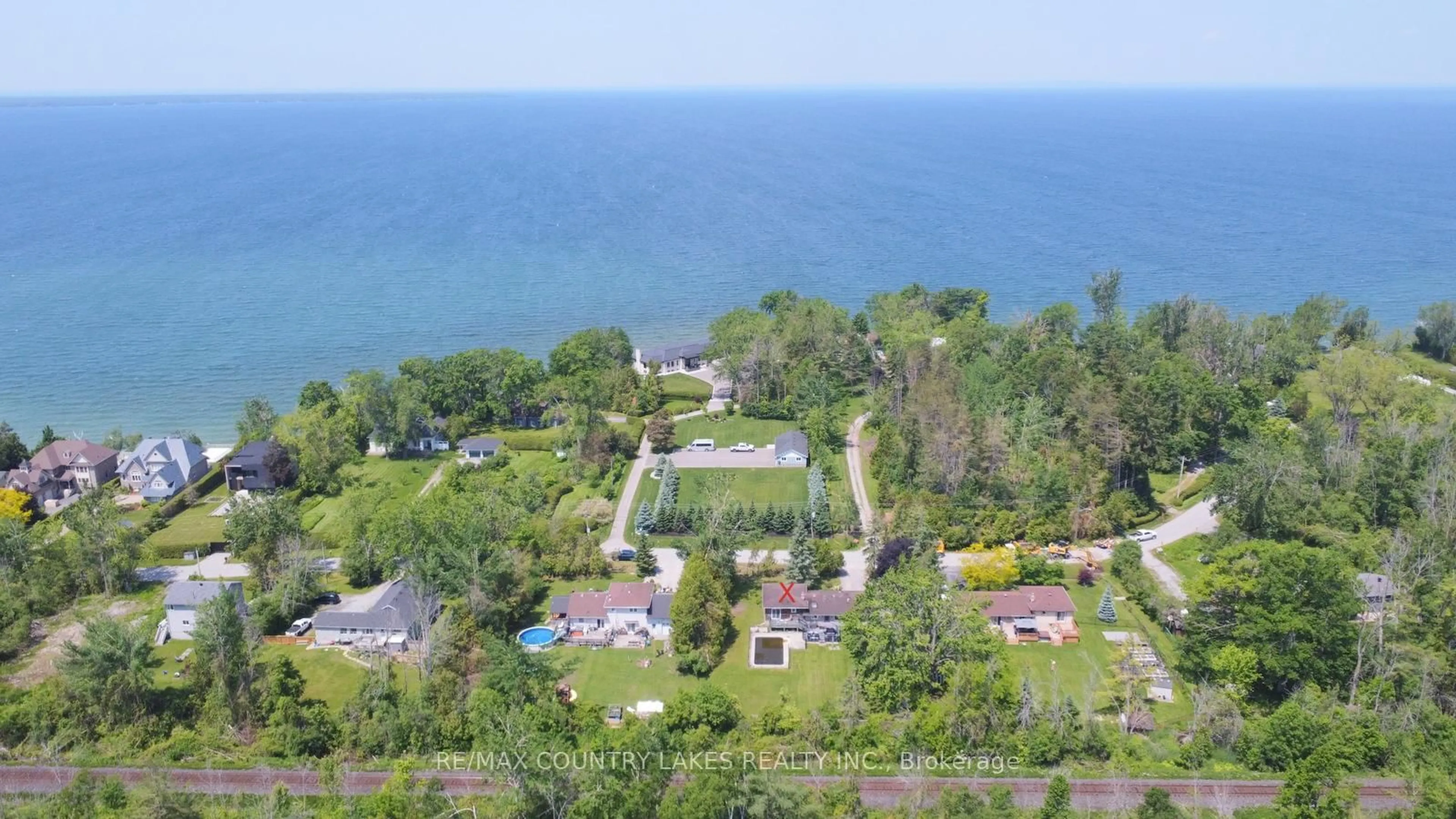 A pic from outside/outdoor area/front of a property/back of a property/a pic from drone, water/lake/river/ocean view for 25725 Maple Beach Rd, Brock Ontario L0K 1A0