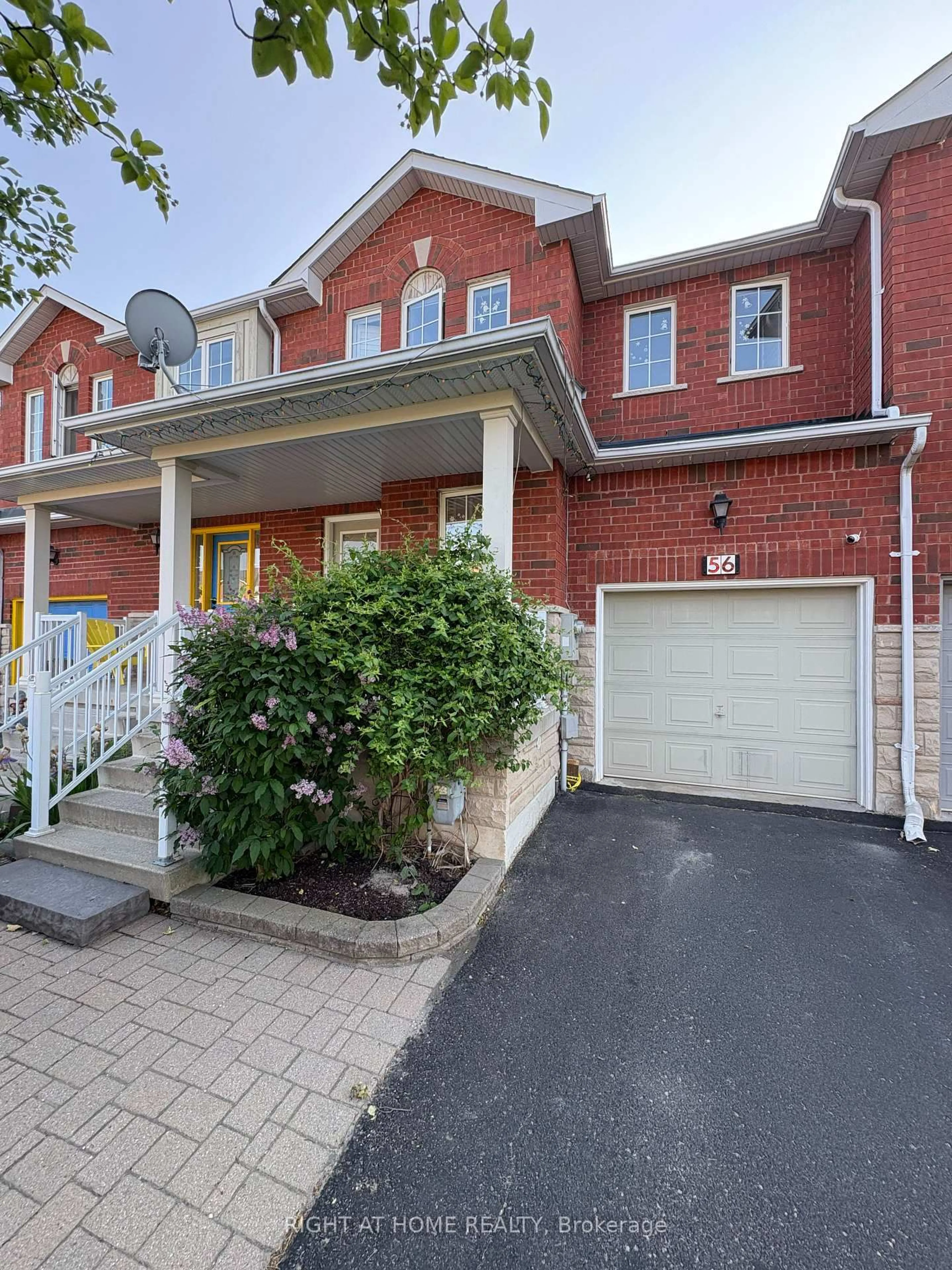 Home with brick exterior material, street for 56 Briarcrest Dr, Markham Ontario L6C 3E7