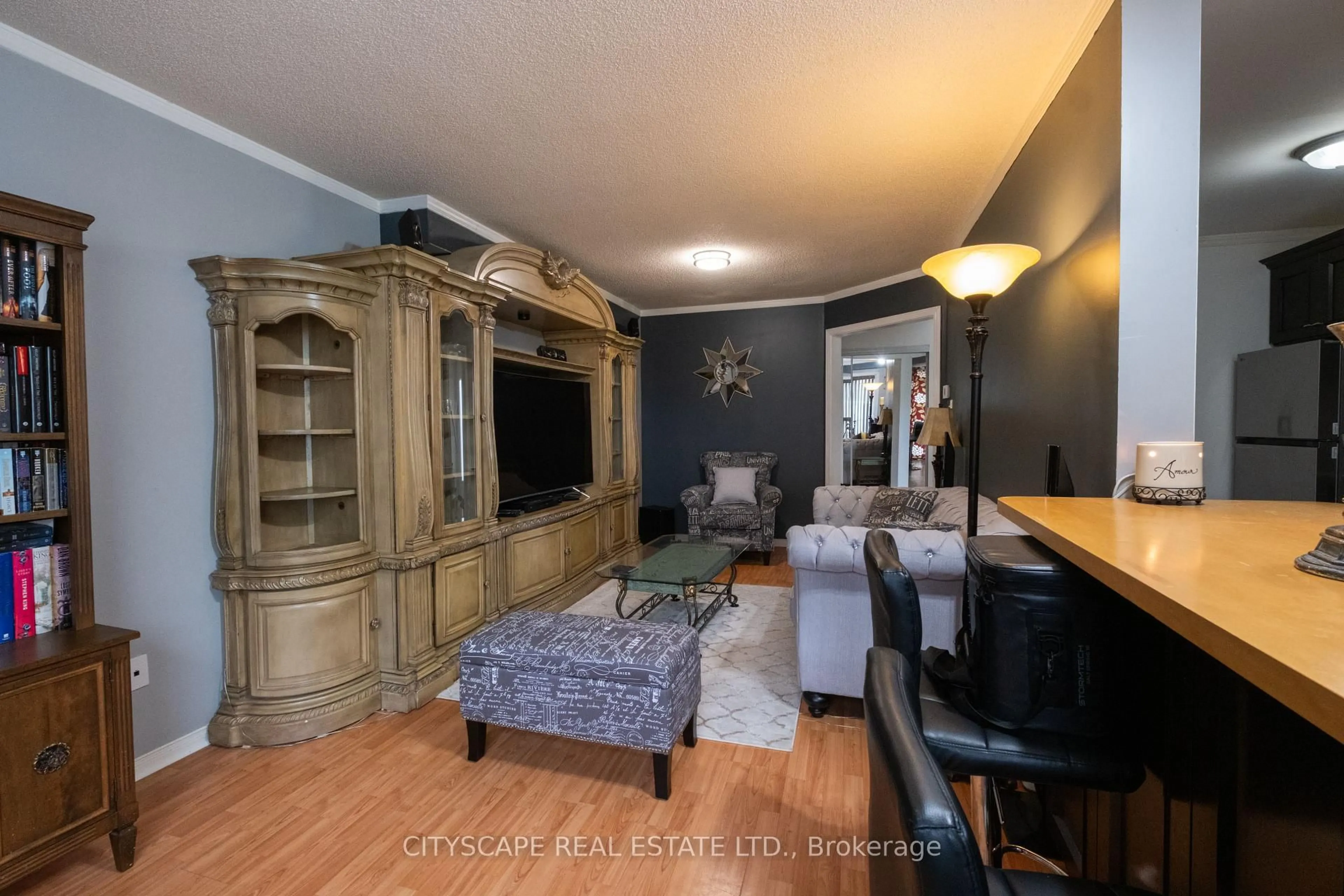 Living room with furniture, wood/laminate floor for 2176 Ferguson St, Innisfil Ontario L9S 1X6