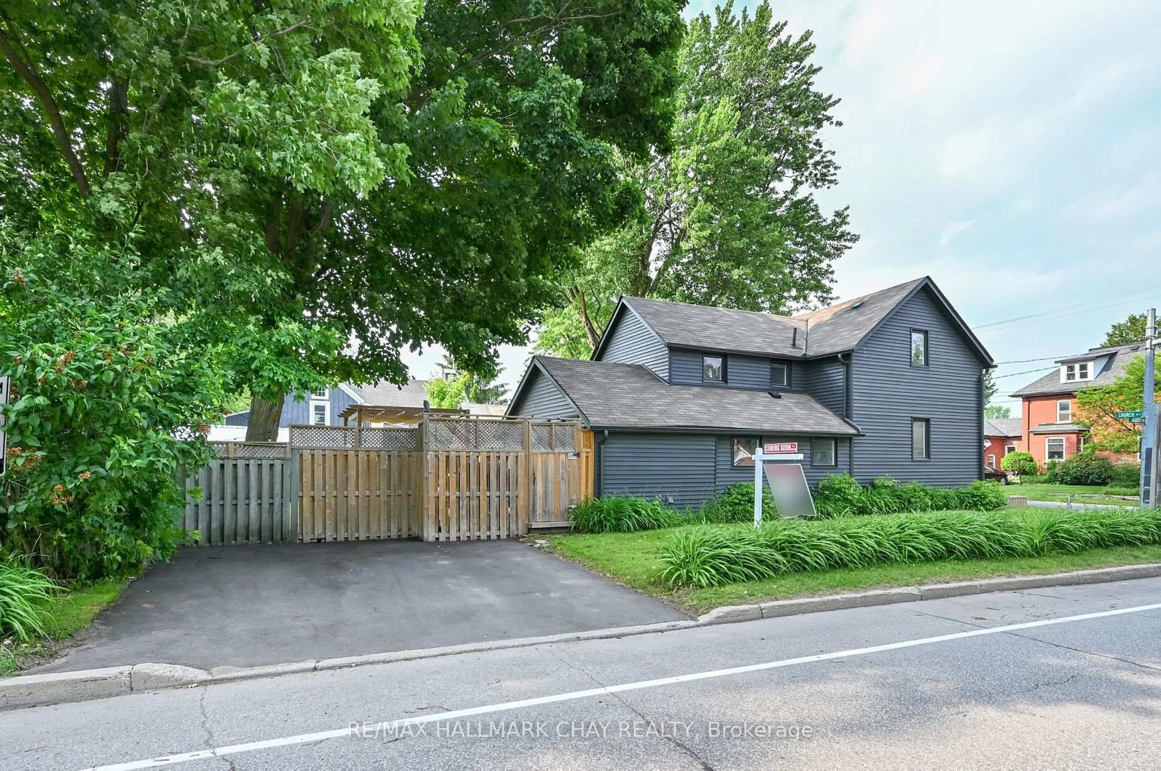A pic from outside/outdoor area/front of a property/back of a property/a pic from drone, street for 70 Church St, New Tecumseth Ontario L9R 1S7