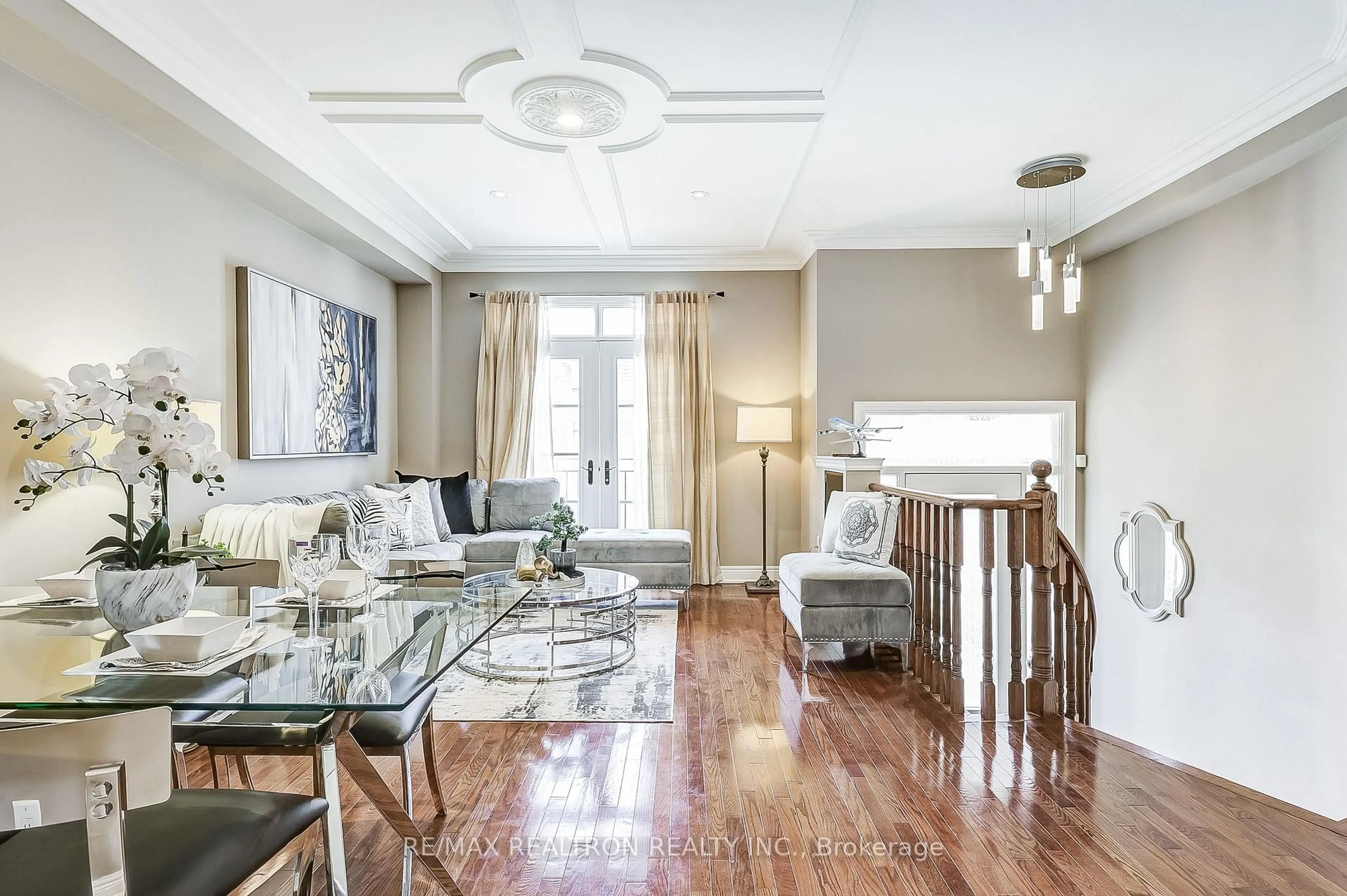 Living room with furniture, wood/laminate floor for 61 Golden Spruce Lane, Vaughan Ontario L6A 0C4