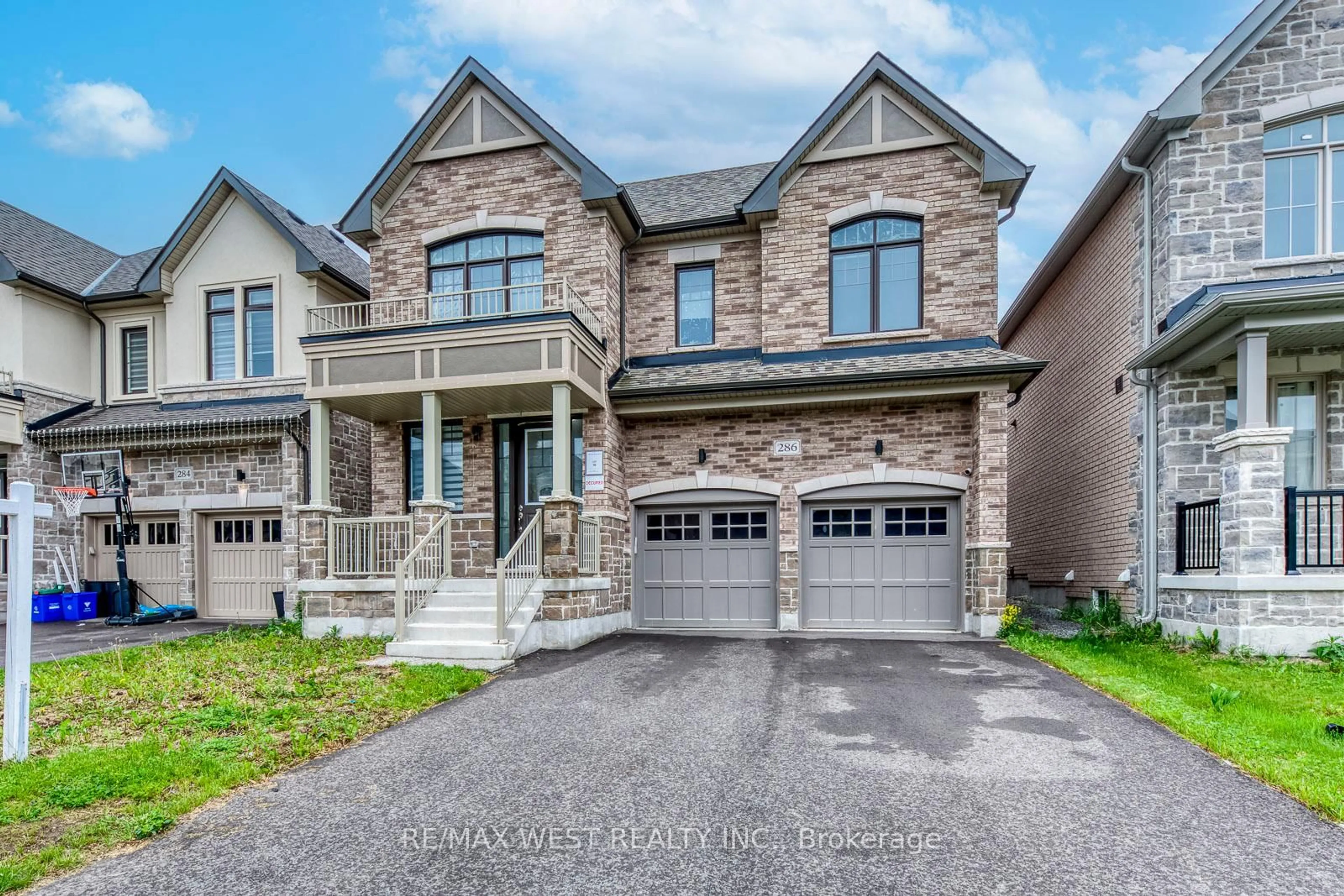 Home with brick exterior material, street for 286 Danny Wheeler Blvd, Georgina Ontario L4P 0J9