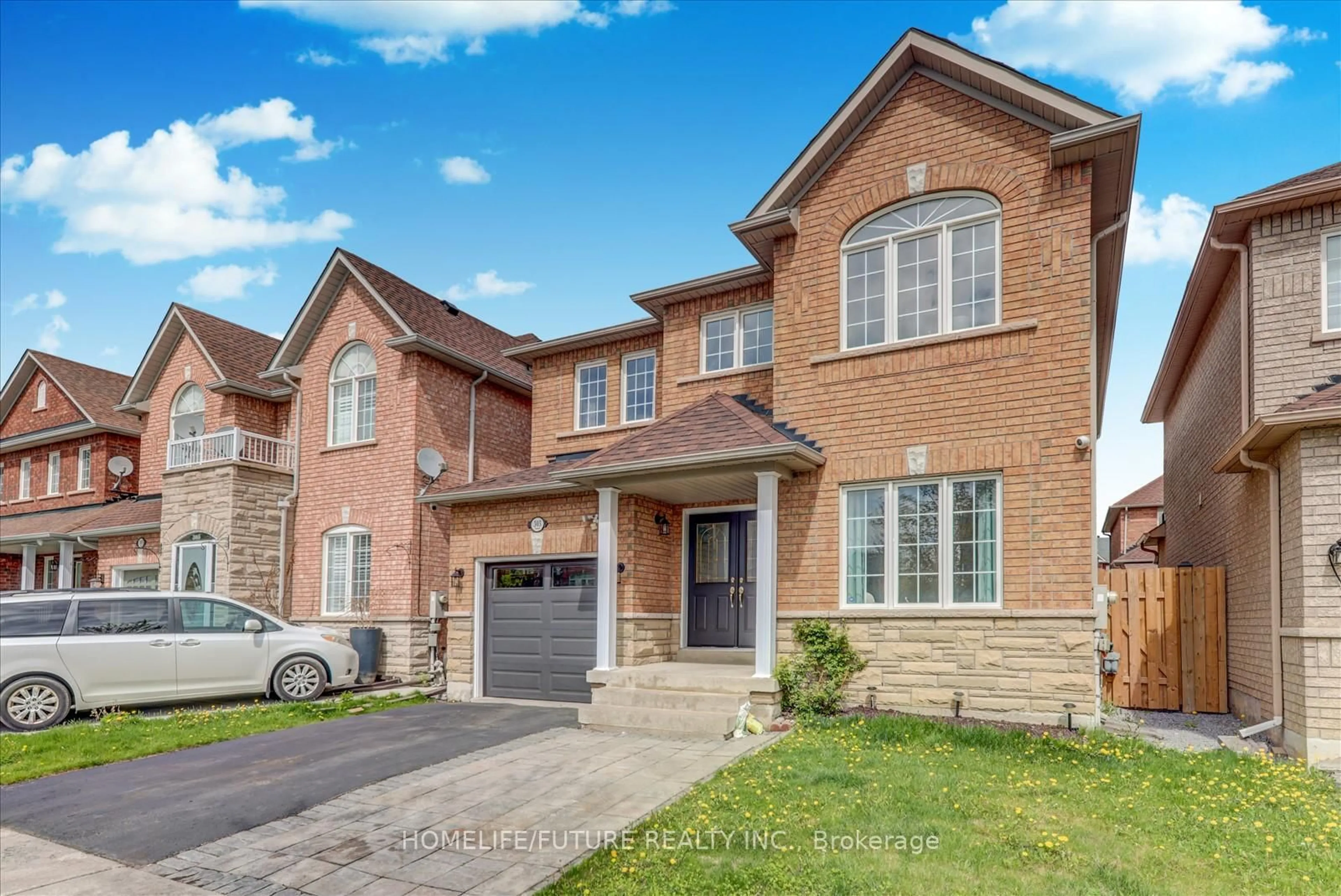 Home with brick exterior material, street for 303 Williamson Rd, Markham Ontario L6E 2A7