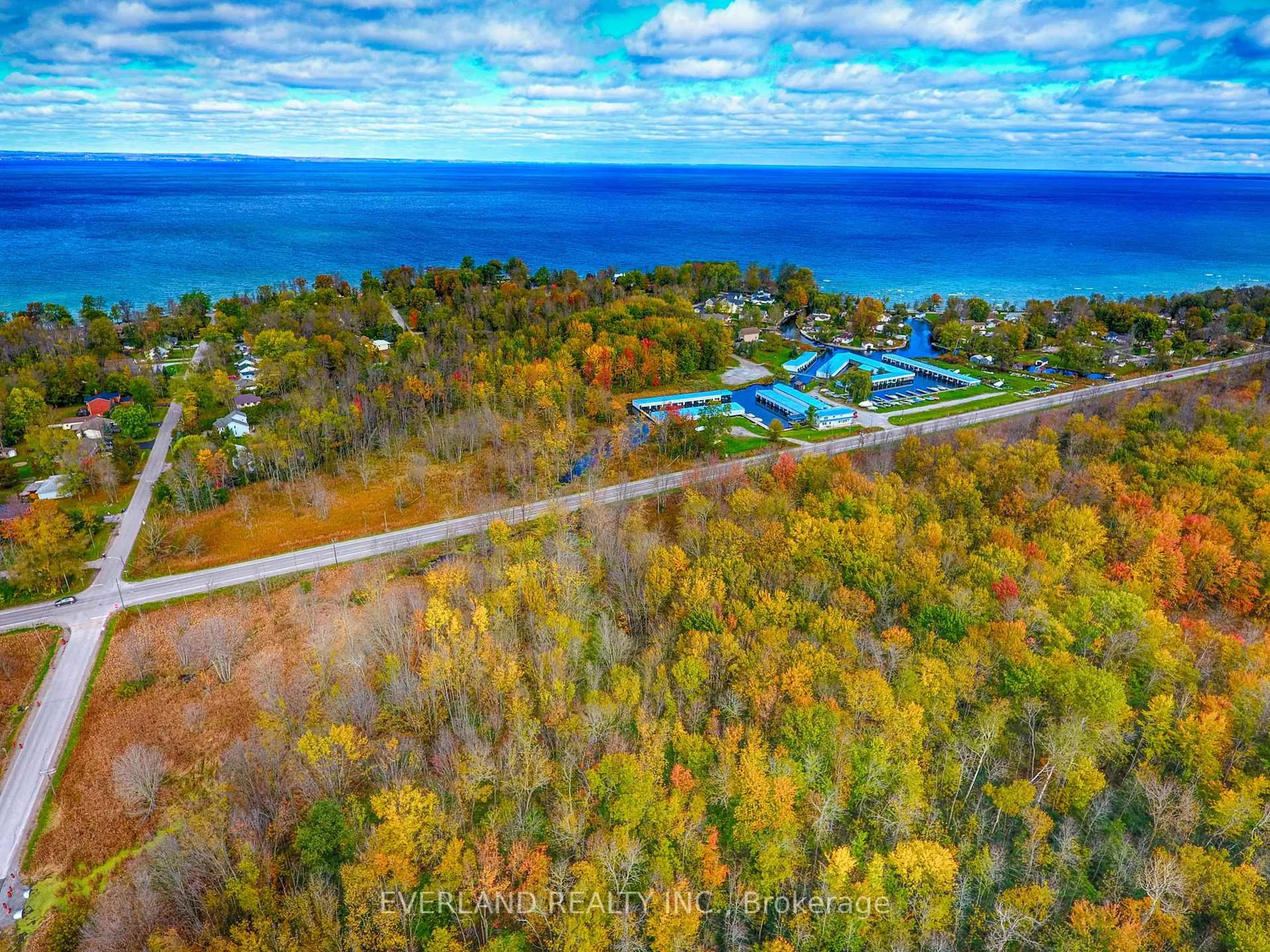 A pic from outside/outdoor area/front of a property/back of a property/a pic from drone, water/lake/river/ocean view for 27001 Civic Centre Rd, Georgina Ontario L4P 3E9