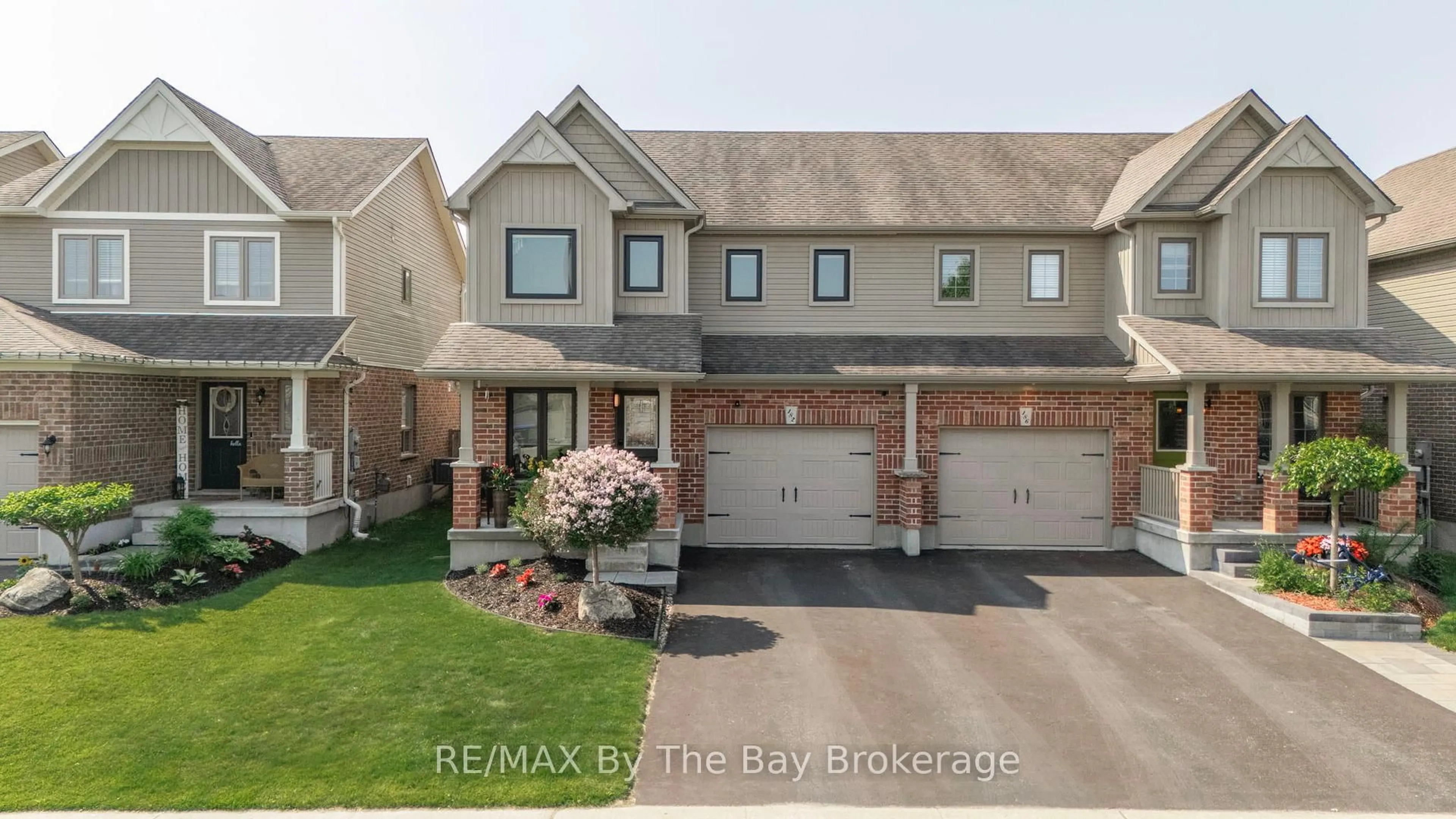 A pic from outside/outdoor area/front of a property/back of a property/a pic from drone, street for 182 Banting Cres, Essa Ontario L0M 1B6