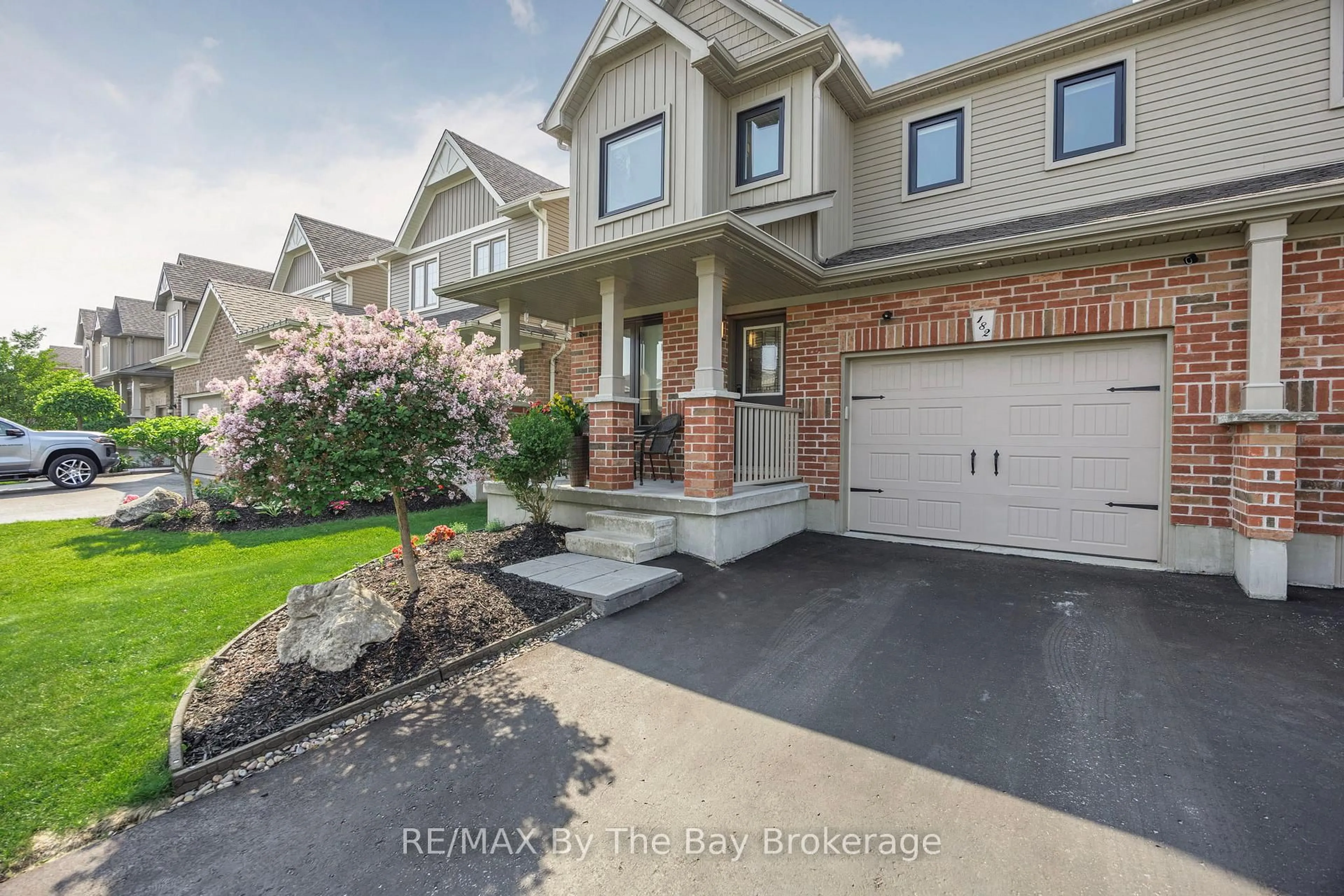 Home with brick exterior material, street for 182 Banting Cres, Essa Ontario L0M 1B6