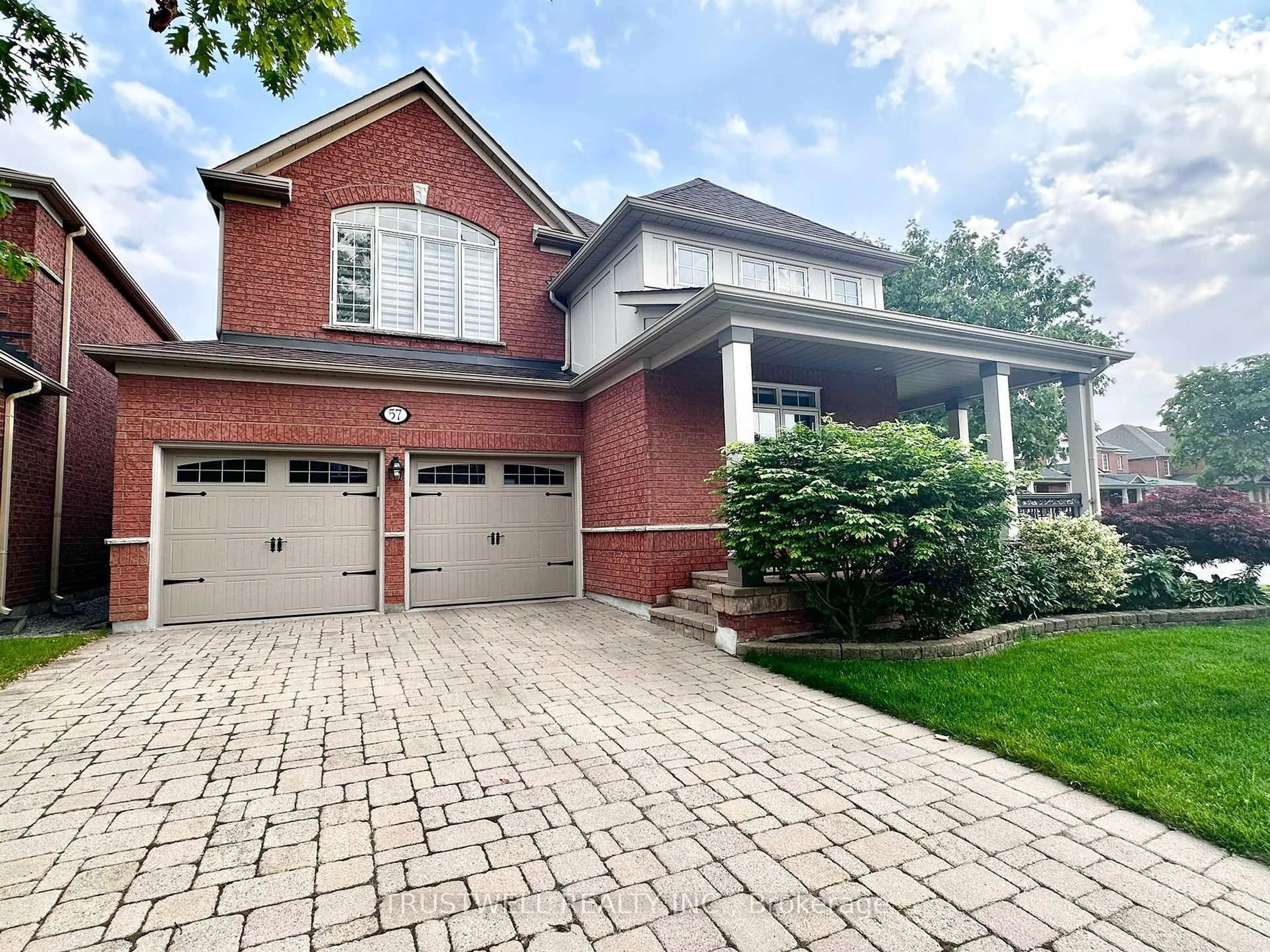 Home with brick exterior material, street for 57 Emery Hill Blvd, Markham Ontario L6C 2T7