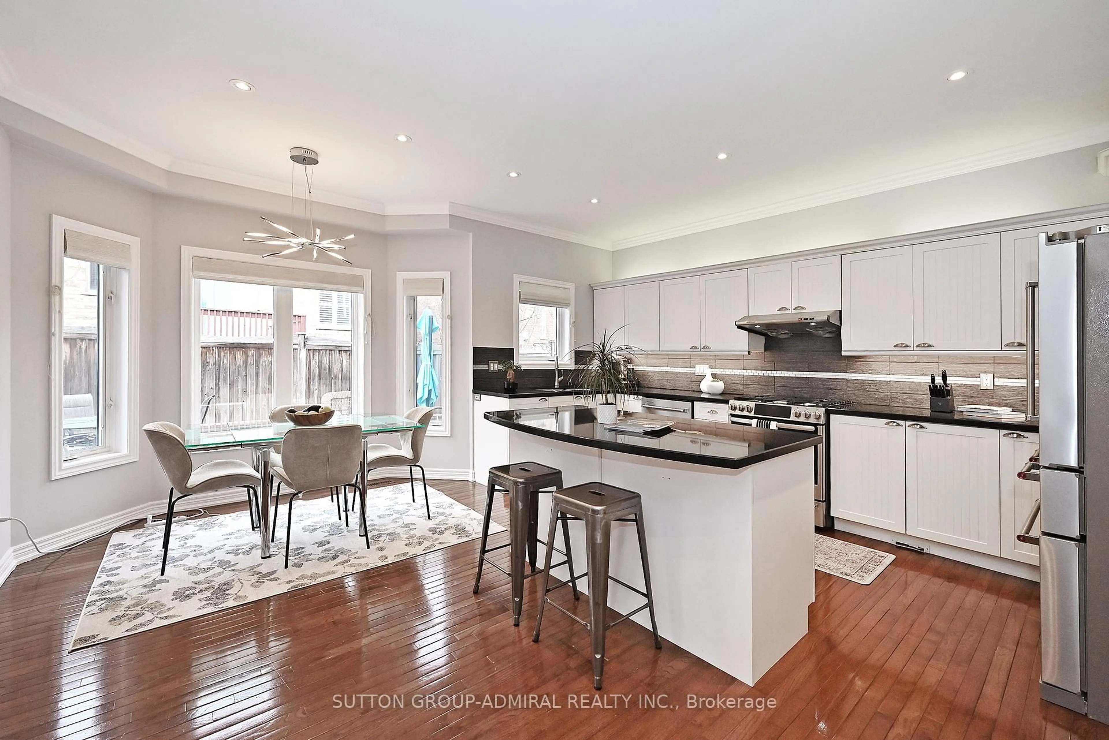 Open concept kitchen, wood/laminate floor for 32 Seabreeze Ave, Vaughan Ontario L4J 8R7