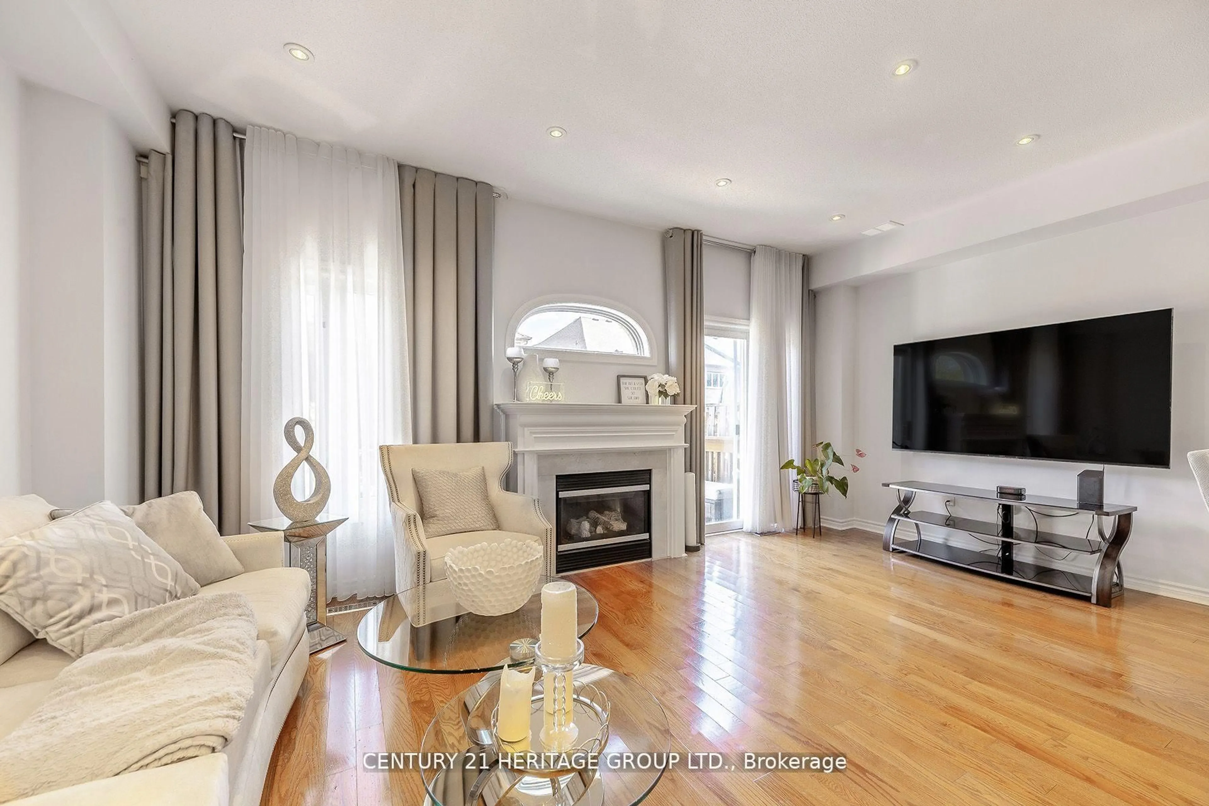 Living room with furniture, wood/laminate floor for 74 Lander Cres, Vaughan Ontario L4J 8T8
