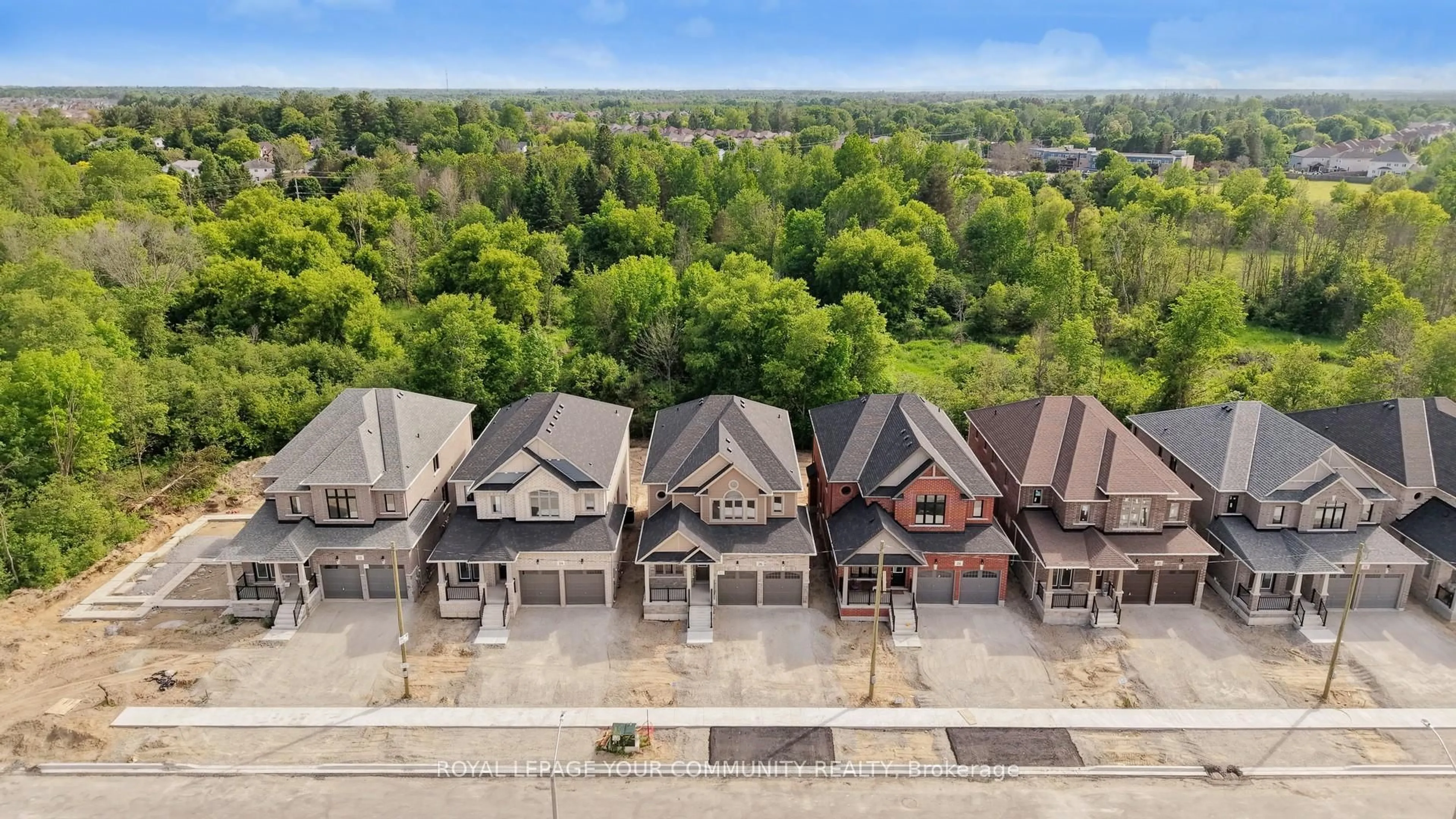 A pic from outside/outdoor area/front of a property/back of a property/a pic from drone, unknown for 26 Baycroft Blvd, Essa Ontario L3W 0L7