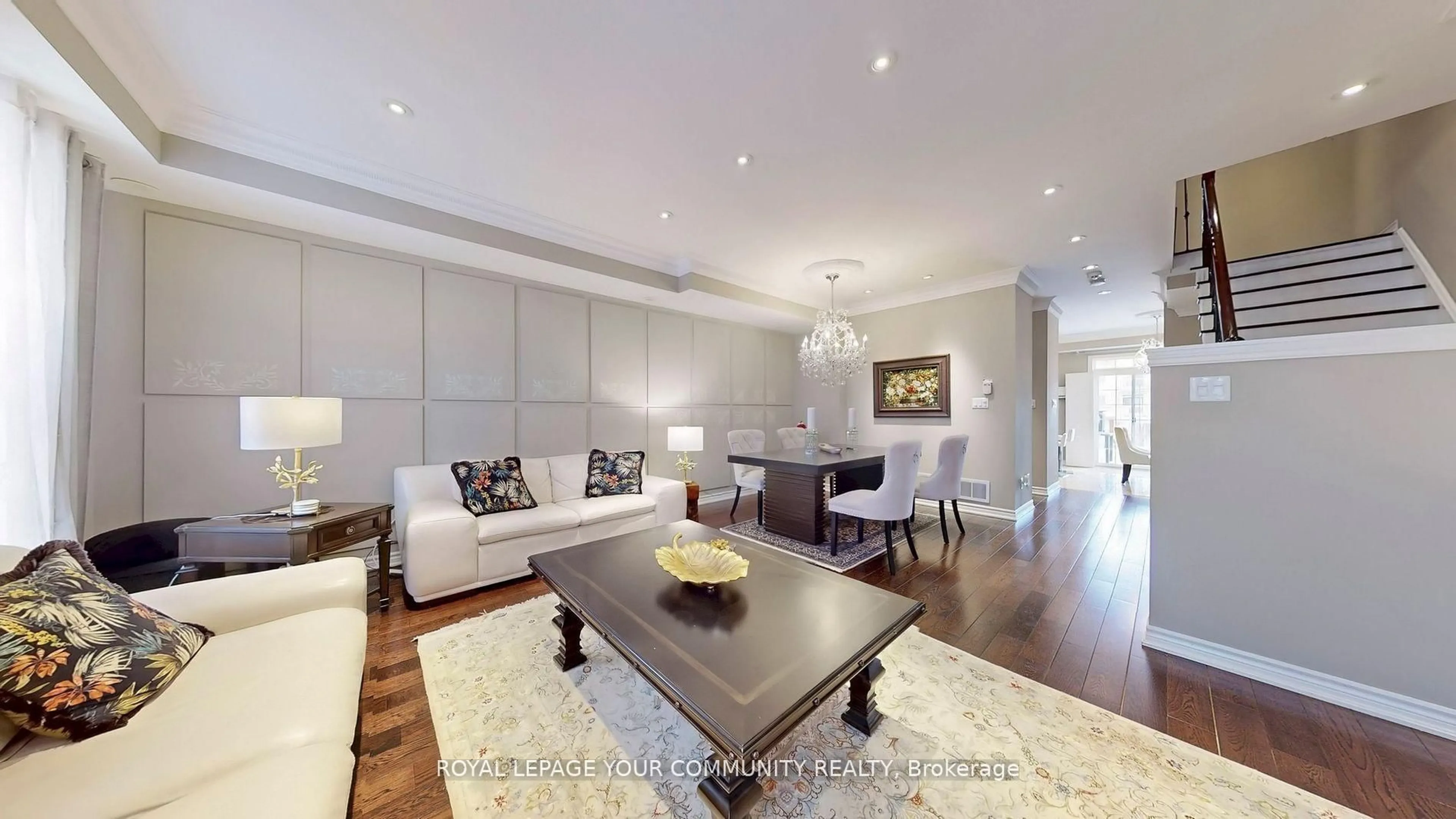 Living room with furniture, wood/laminate floor for 52 Donald Butteress Blvd, Markham Ontario L6C 0K5