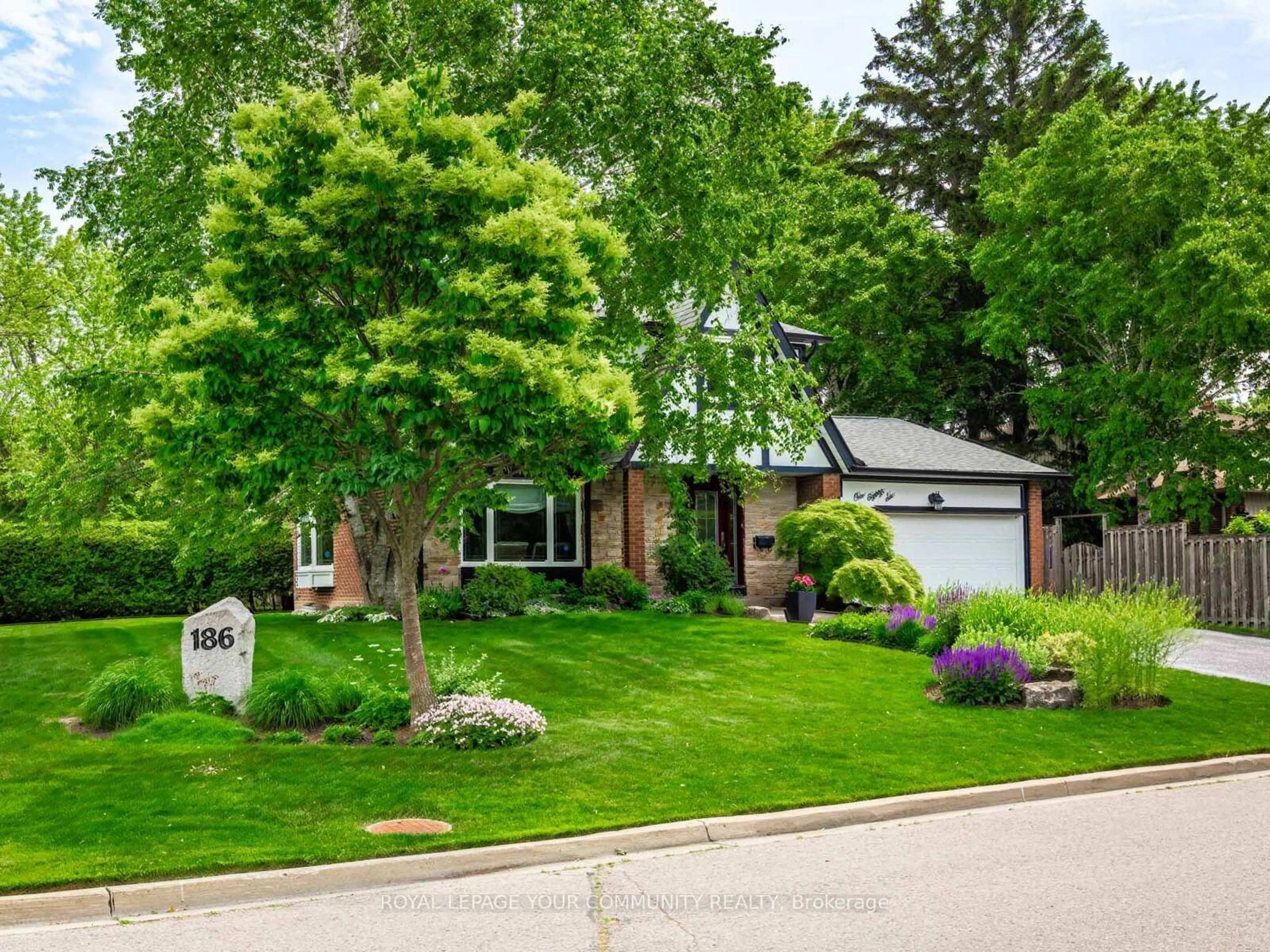 Home with brick exterior material, street for 186 Romfield Crct, Markham Ontario L3T 3J1