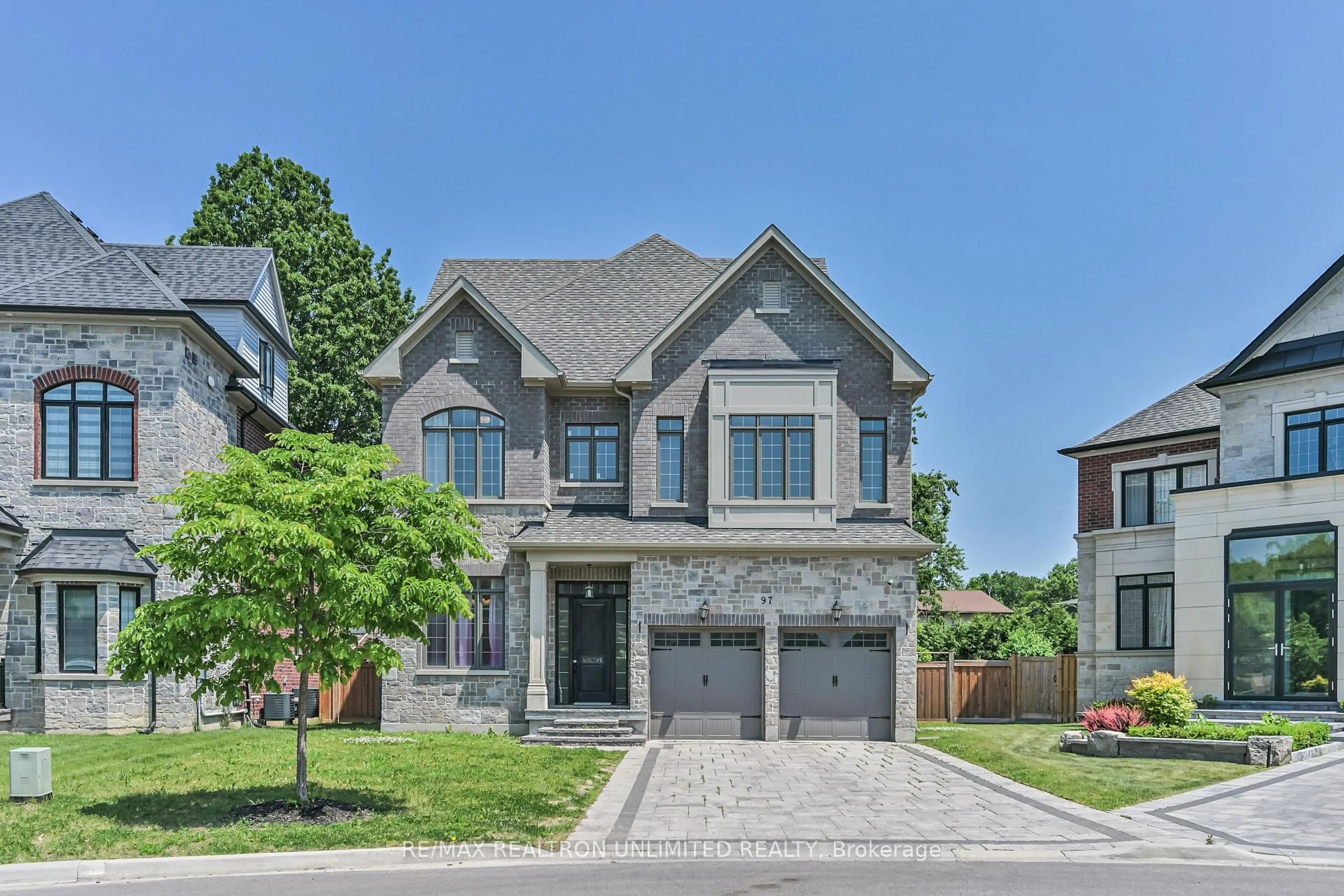 Home with brick exterior material, street for 97 Fitzgerald Ave, Markham Ontario L3R 4Z7