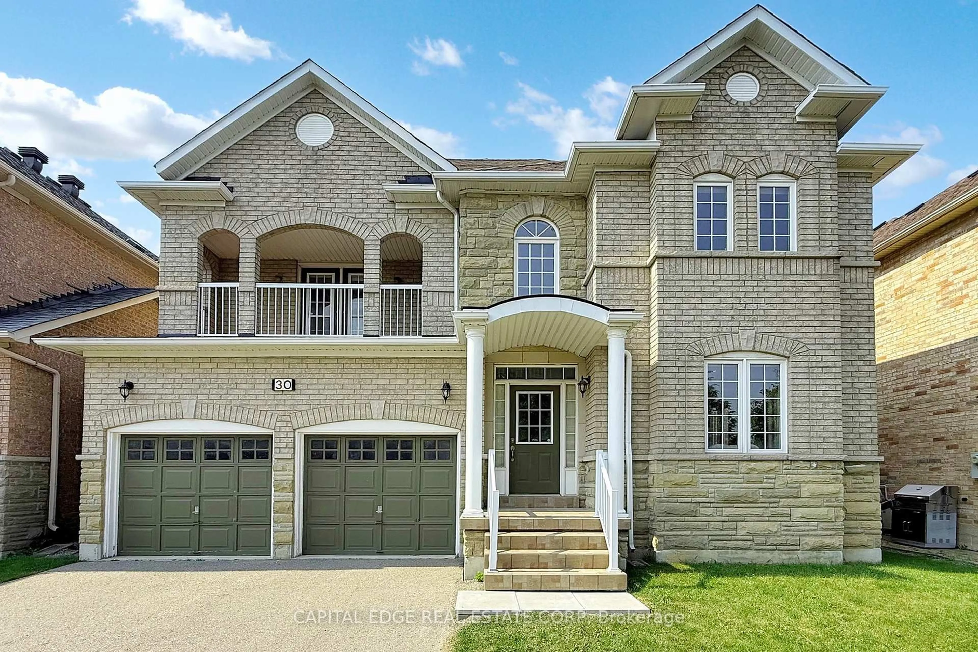 Home with brick exterior material, street for 30 Swan Park Rd, Markham Ontario L6E 1Z6